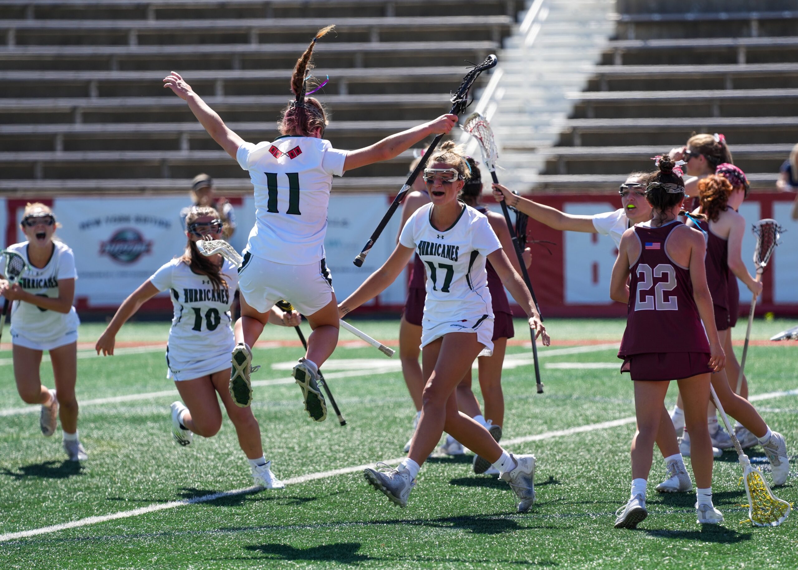 Senior Lily Berchin celebrates her game-tying goal with her teammates. RON ESPOSITO