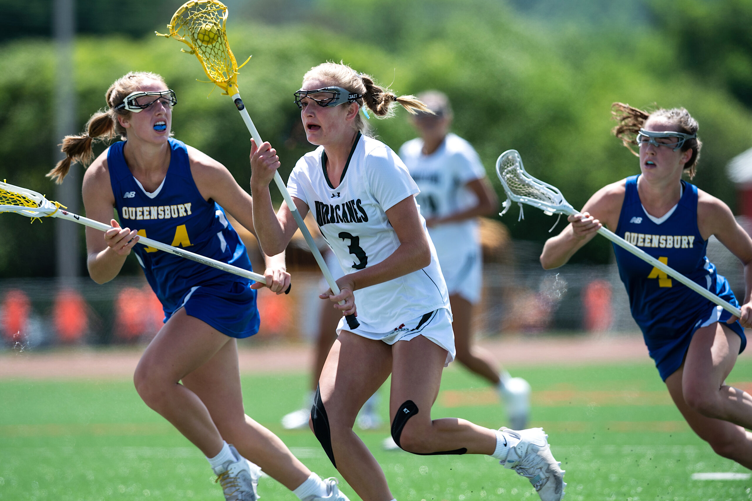 Freshman defender and midfielder Lily Graves carries the ball up the field. TODD MICHALEK