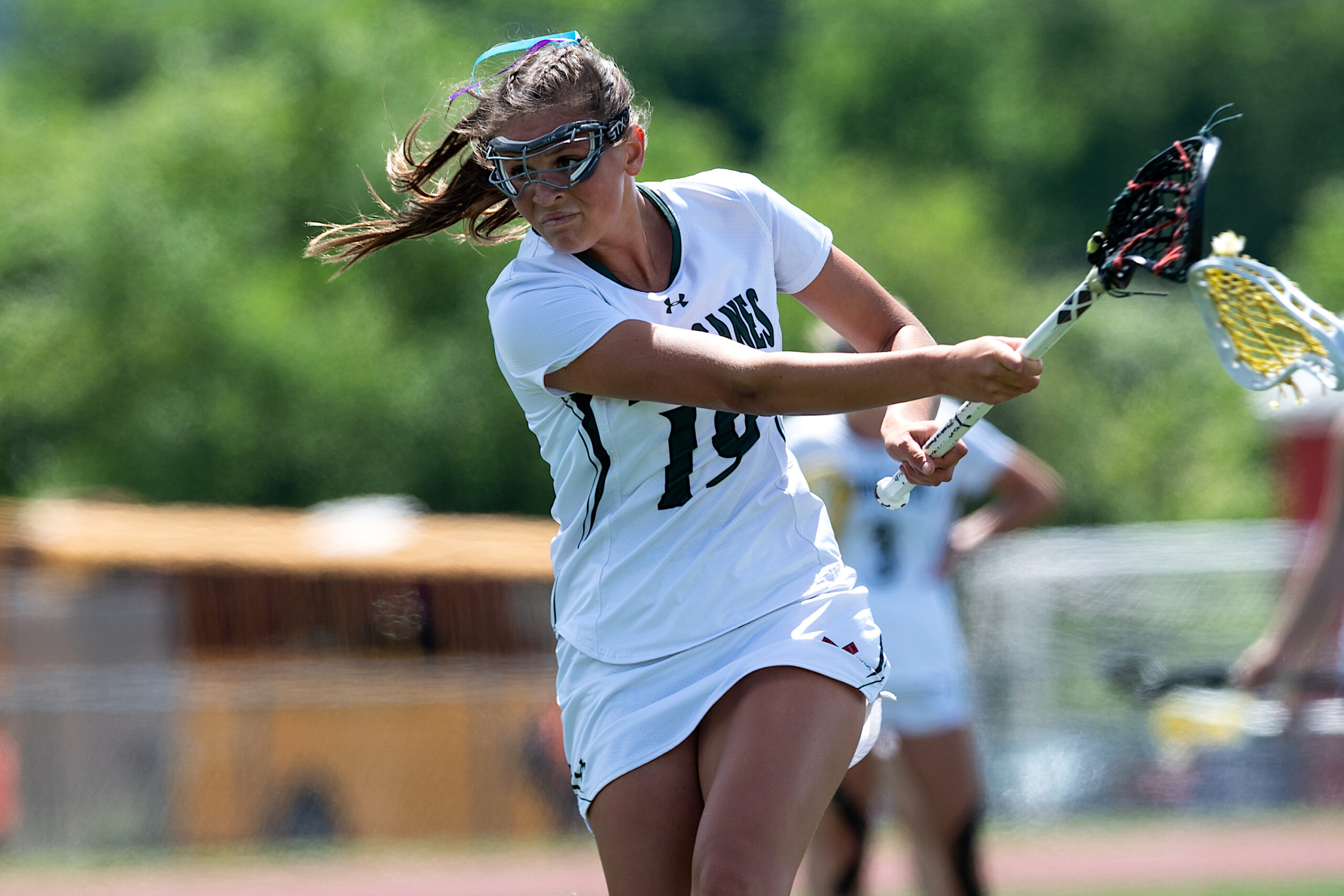 Westhampton Beach senior midfielder Olivia Rongo shoots and scores on one of her free position shots. TODD MICHALEK