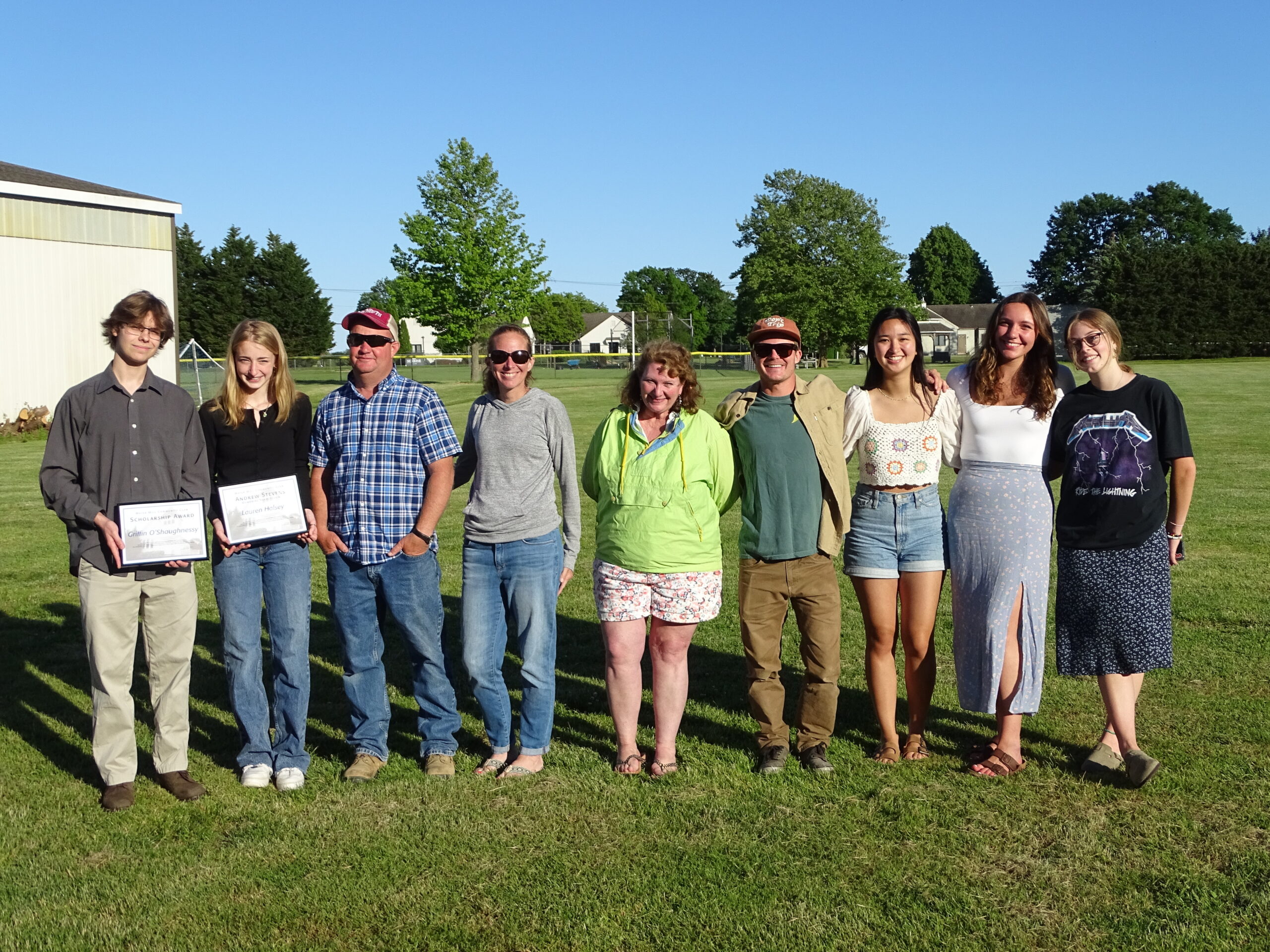 Some past recipients of the Water Mill Community Club's scholarship, along with this year's winners, turned out for the club's annual rocket launch and barbecue on Sunday, June 5. From left,  Griffin O’Shaughnessy, Lauren Halsey, Adam Halsey, Jill Raynor, Teal Vella, Caleb Muller, Katelyn Morris, Morgan Dykeman and Kaylie Wilson.  COURTESY DANIEL MCKEEVER
