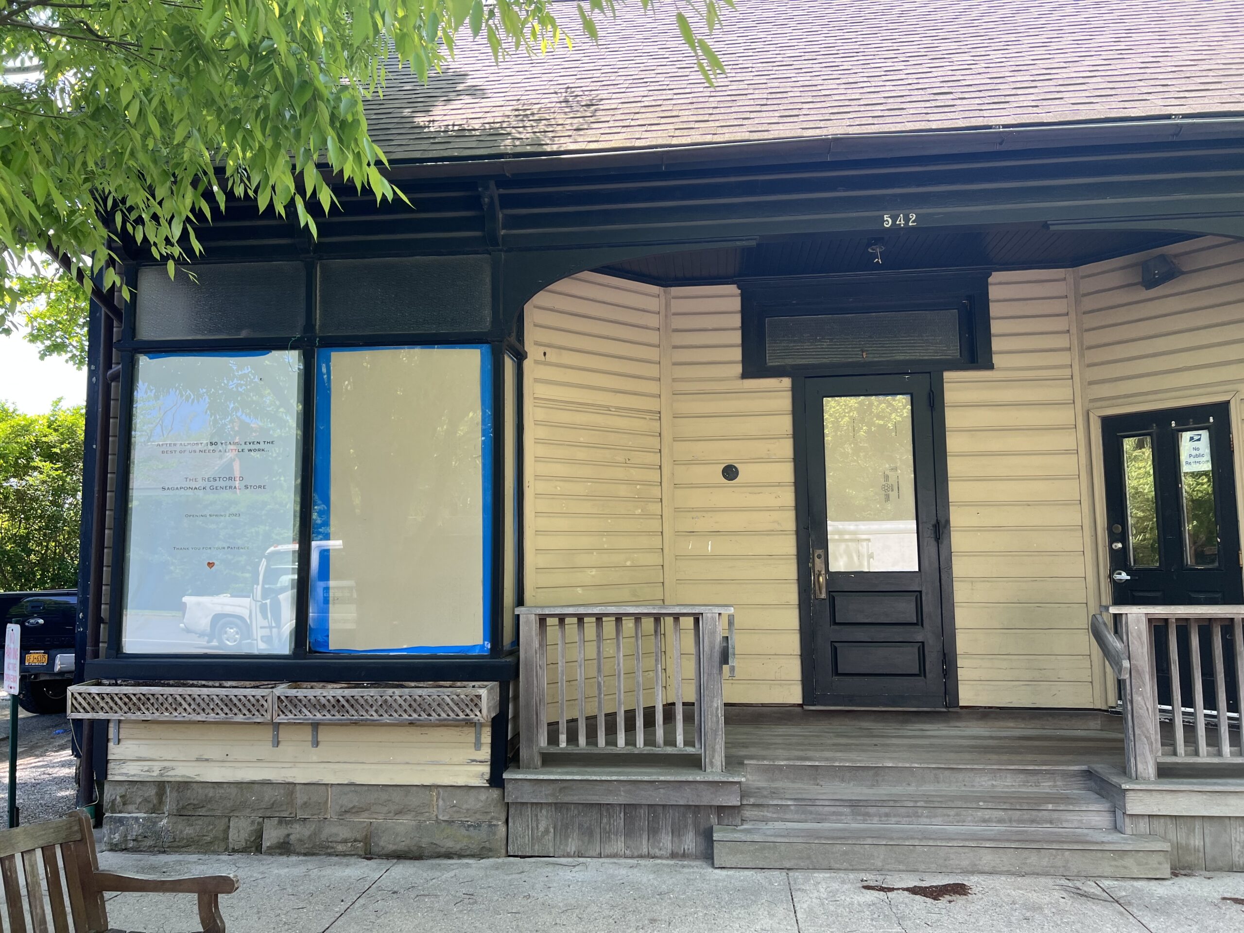 A sign in the left window of the Sagaponack General Store announces plans for a restoration and reopening in spring of 2023.