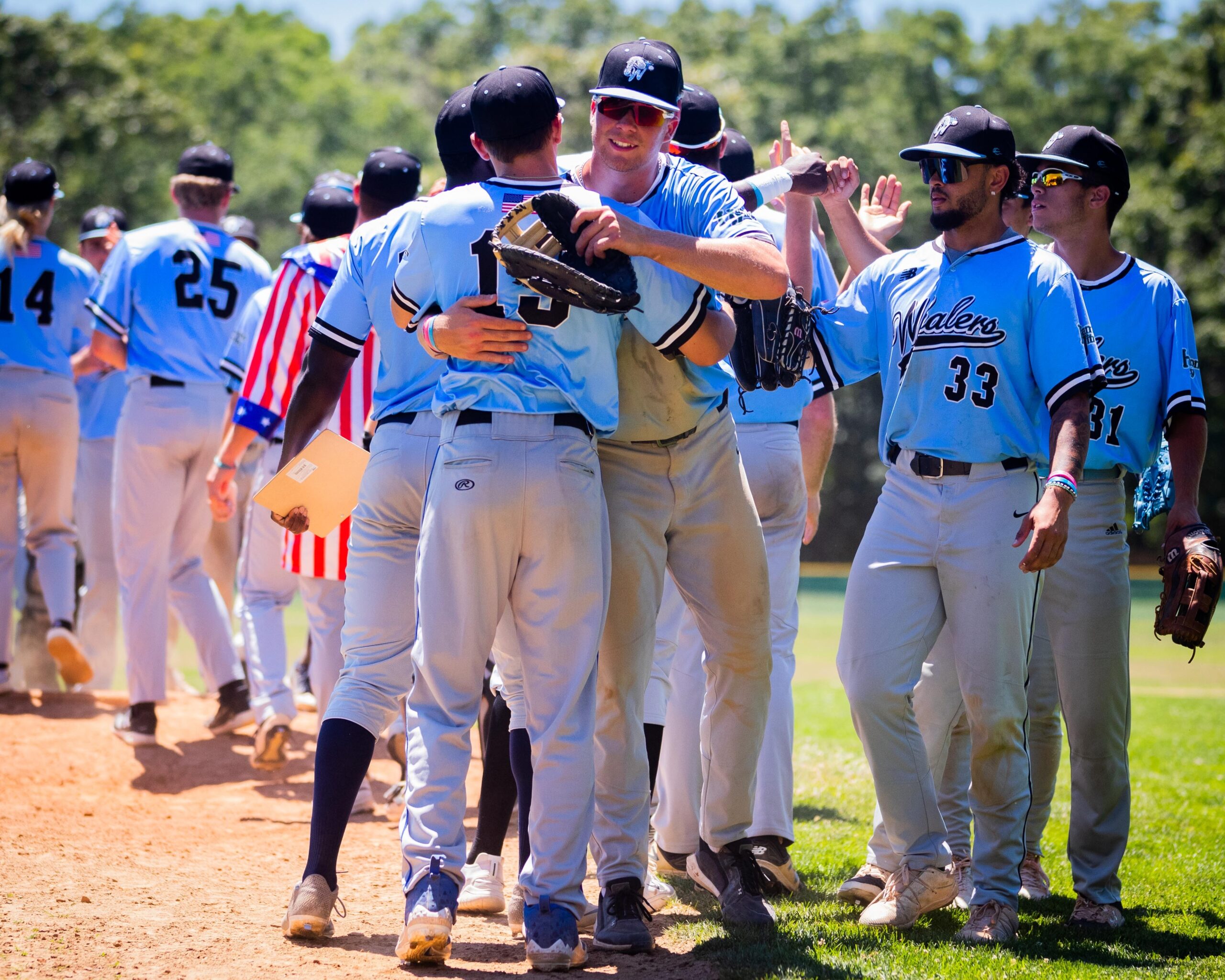 The Whalers congratulate each other after their 5-2 victory over the Bucks on Monday.    DEMETRIUS KAZANAS