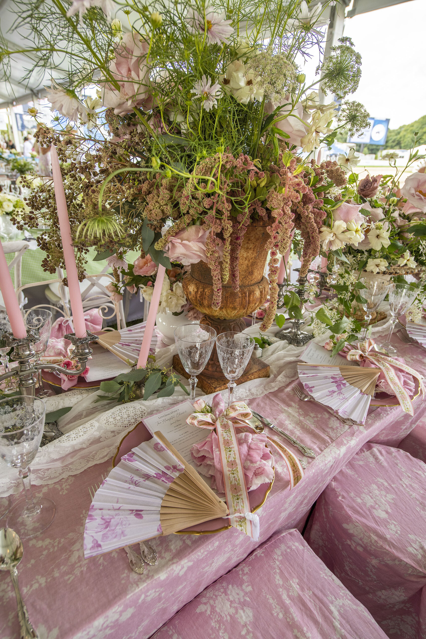 The table setting for LoveShackFancy in the VIP tent at the 2021 Hampton Classic on Grand Prix Sunday, September 5th, 2021