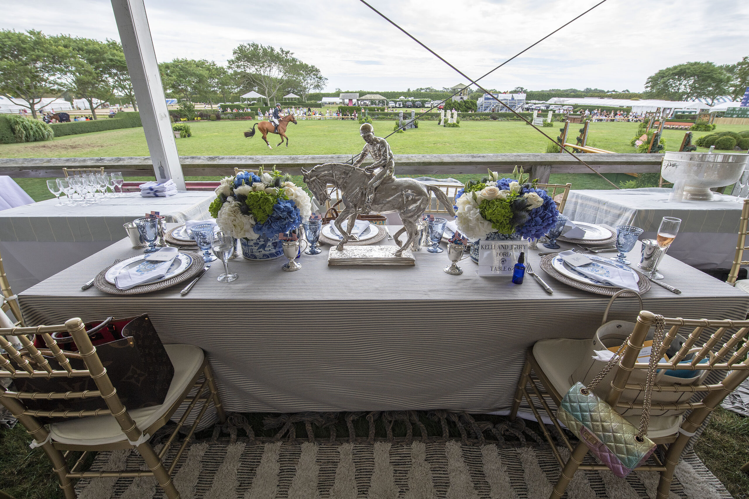 The table setting for the Kelli & Jerry Ford table in the VIP tent at the 2021 Hampton Classic on Grand Prix Sunday, September 5th, 2021