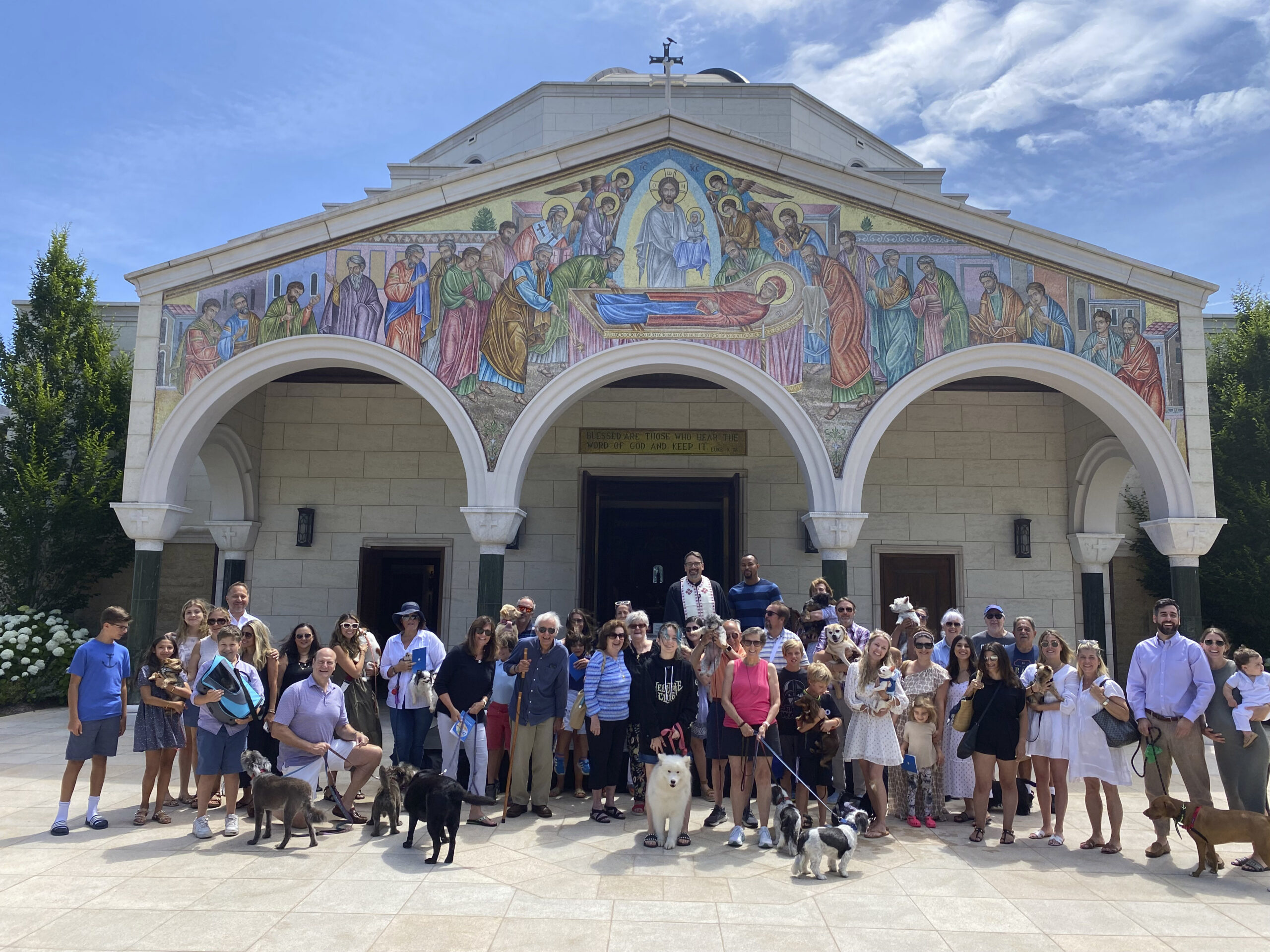 Father Constantine presiding over the Blessing of the Animals at the Dormition of the Virgin Mary Greek Orthodox Church of the Hamptons.   GREG D'ELIA