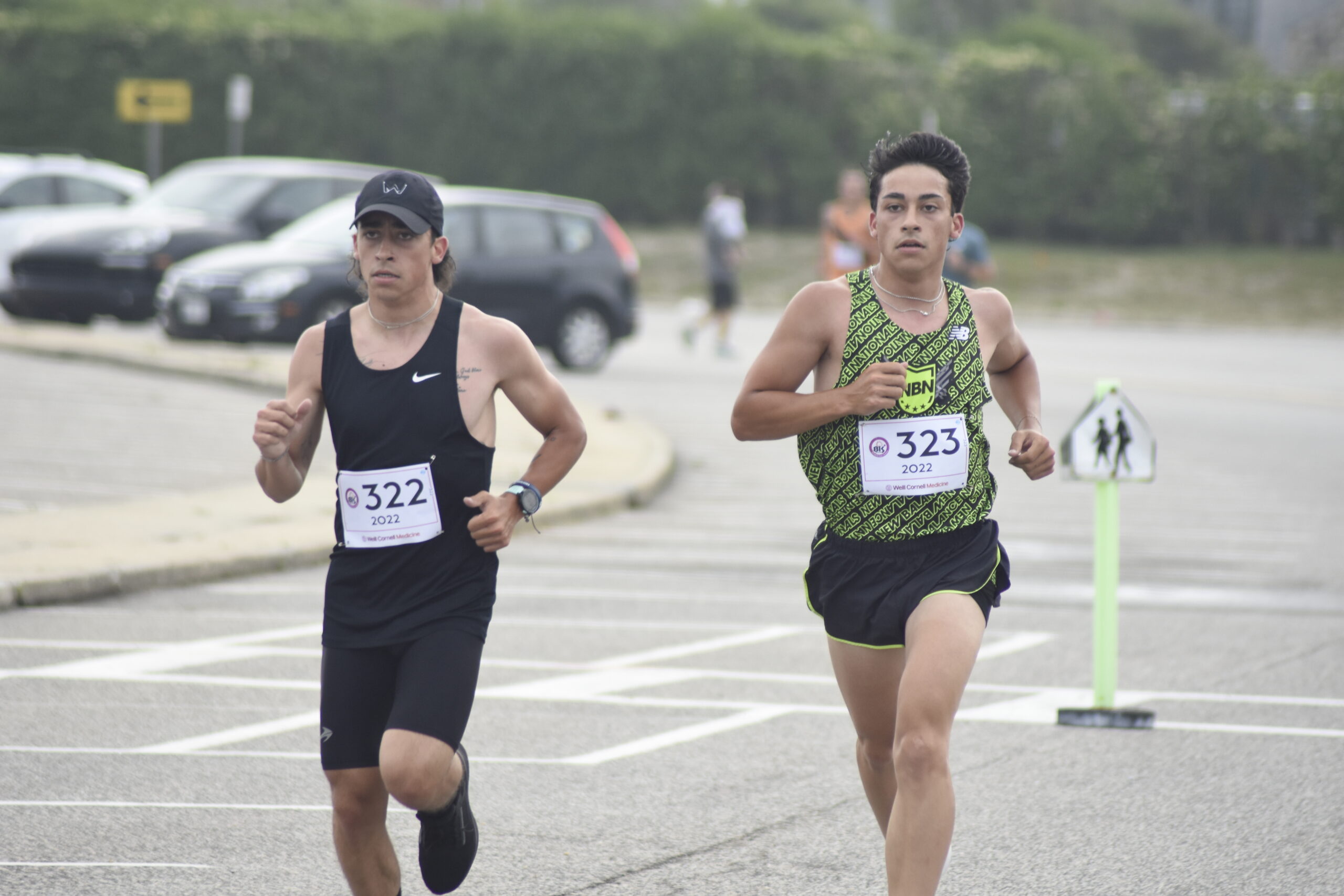 The Loffel Brothers, John, left, and James, led the first half of Sunday morning's race.    DREW BUDD