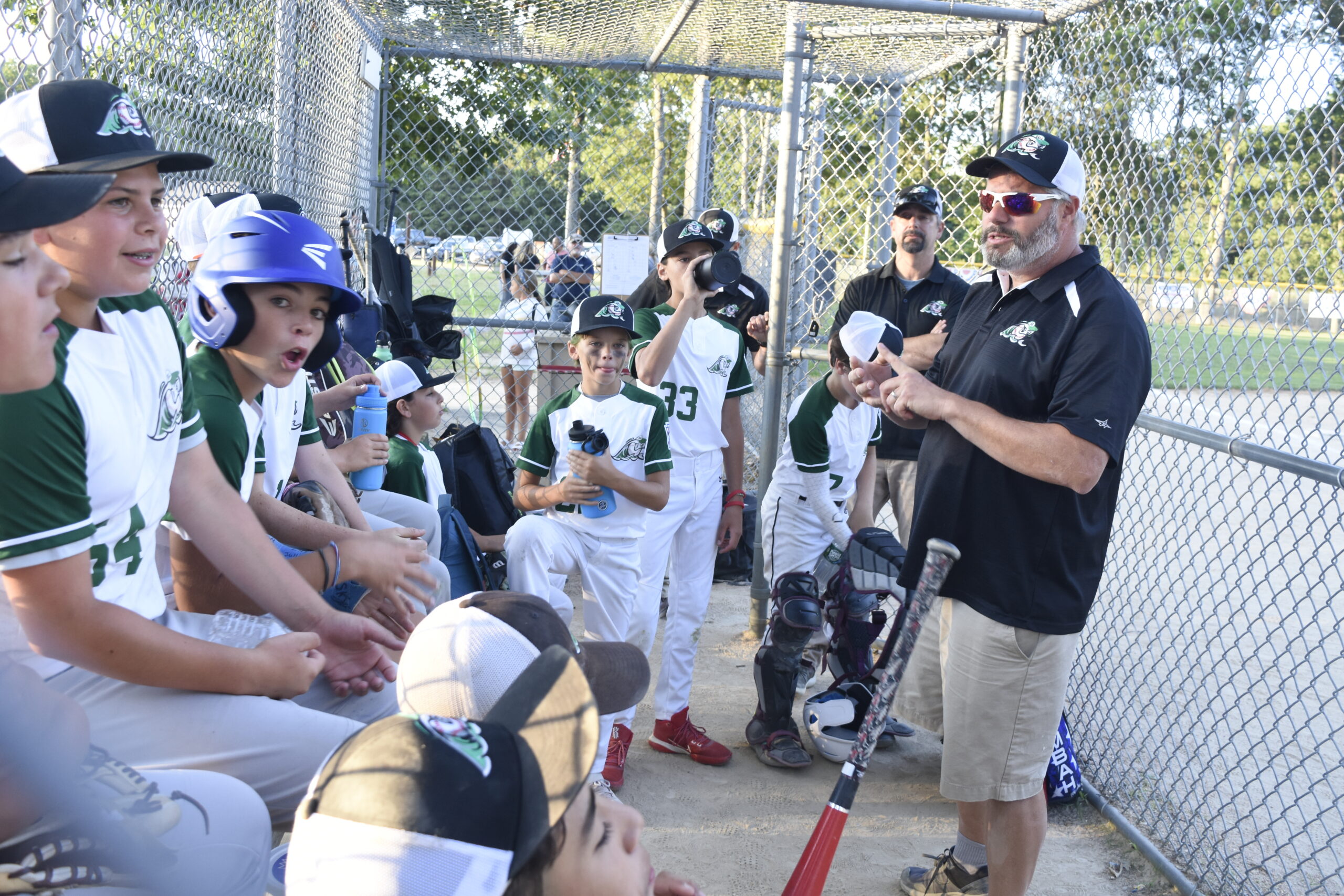 Manager Bill Dawson talks to his team after its 7-0 victory over Moriches Bay on Monday put it into the district finals, which are this Thursday.   DREW BUDD