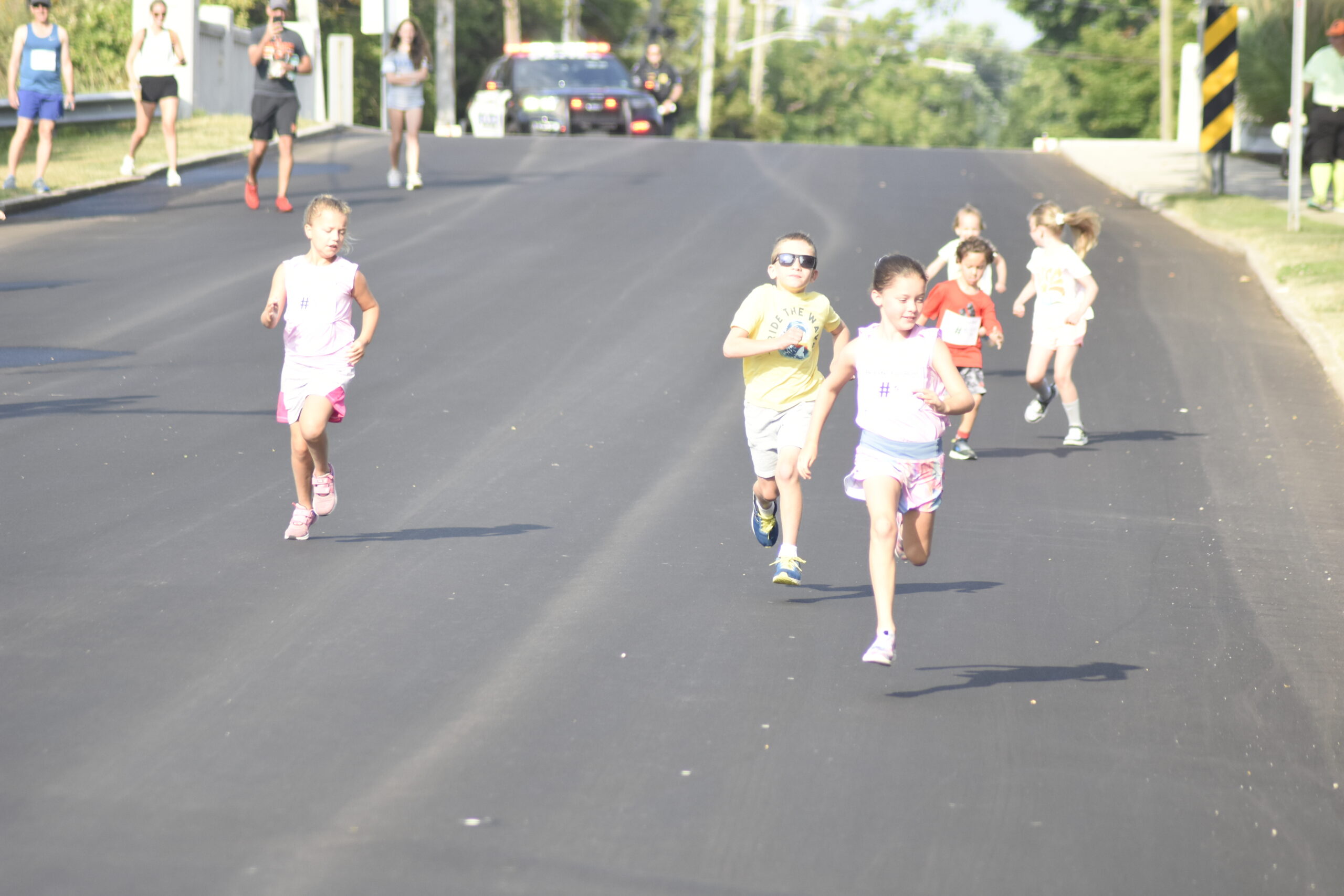 Kids enjoy the fun run prior to the Joe Koziarz Memorial 5K.    DREW BUDD
