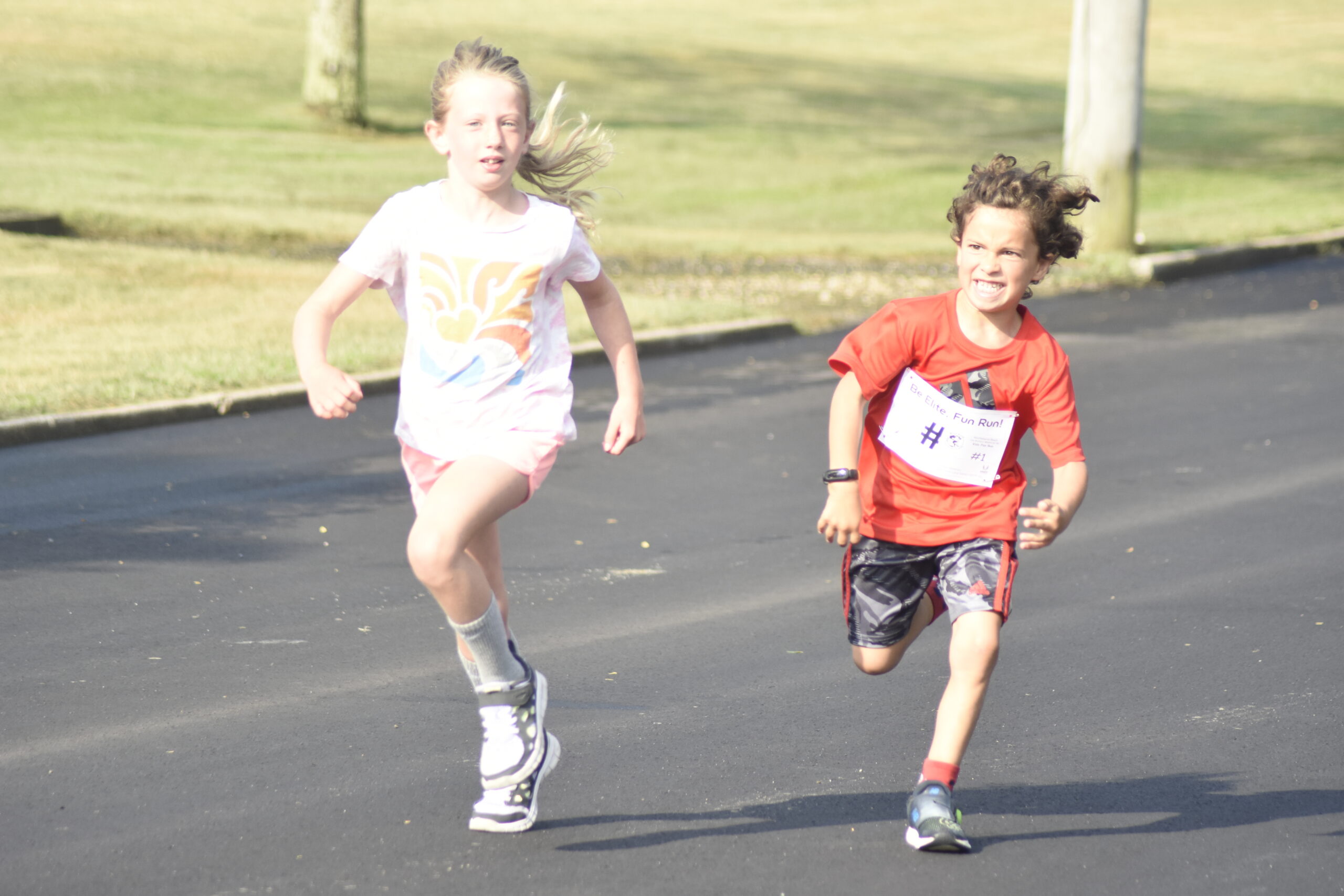 Kids enjoy the fun run prior to the Joe Koziarz Memorial 5K.    DREW BUDD