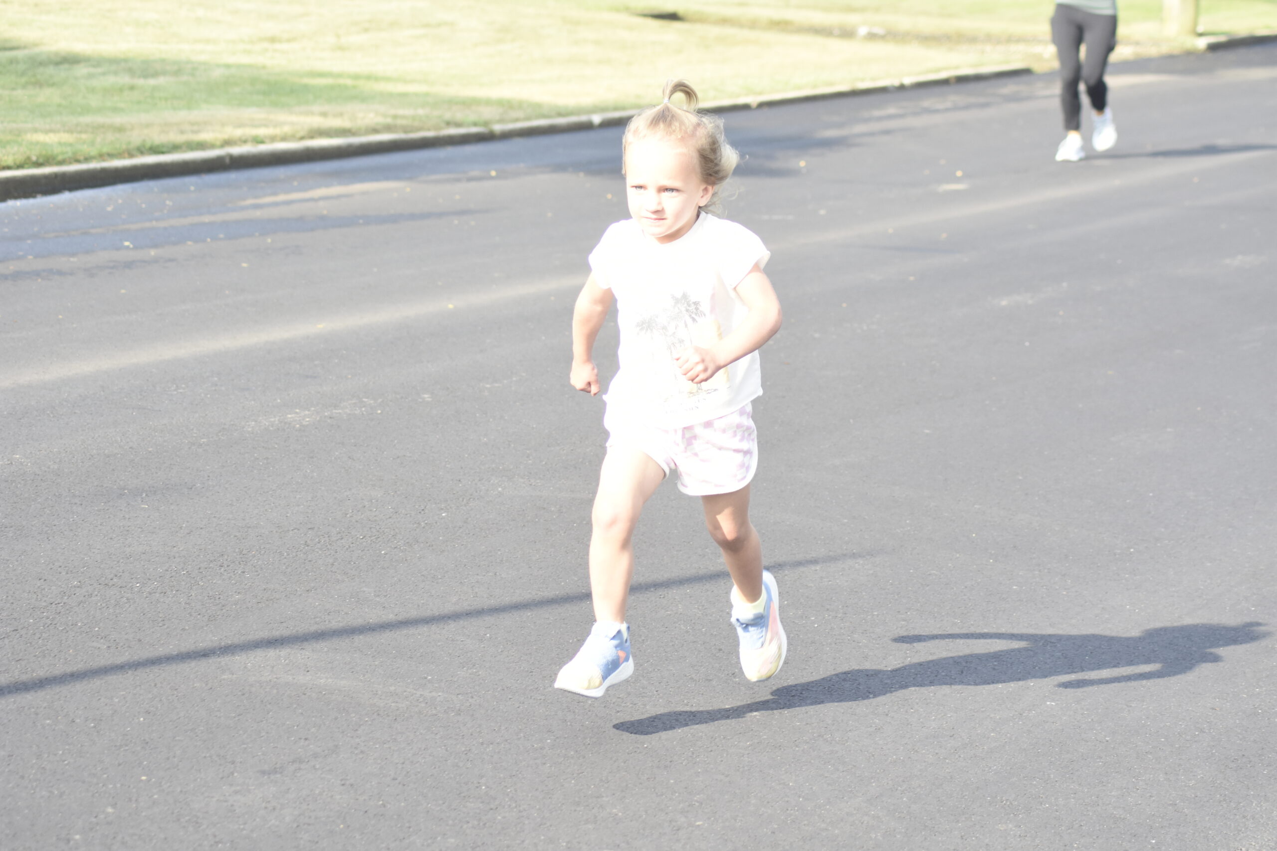 Kids enjoy the fun run prior to the Joe Koziarz Memorial 5K.    DREW BUDD