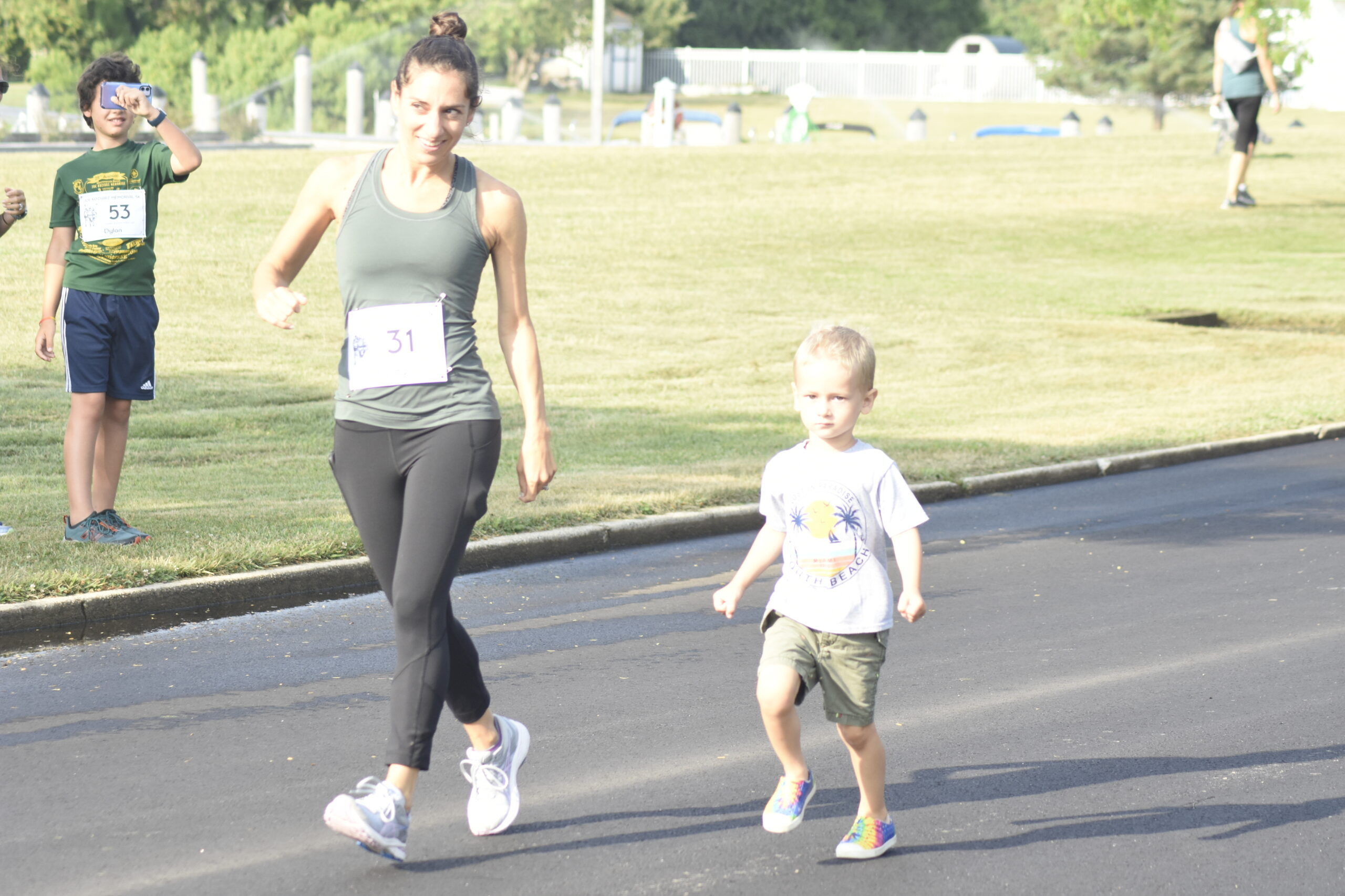 Kids enjoy the fun run prior to the Joe Koziarz Memorial 5K.    DREW BUDD