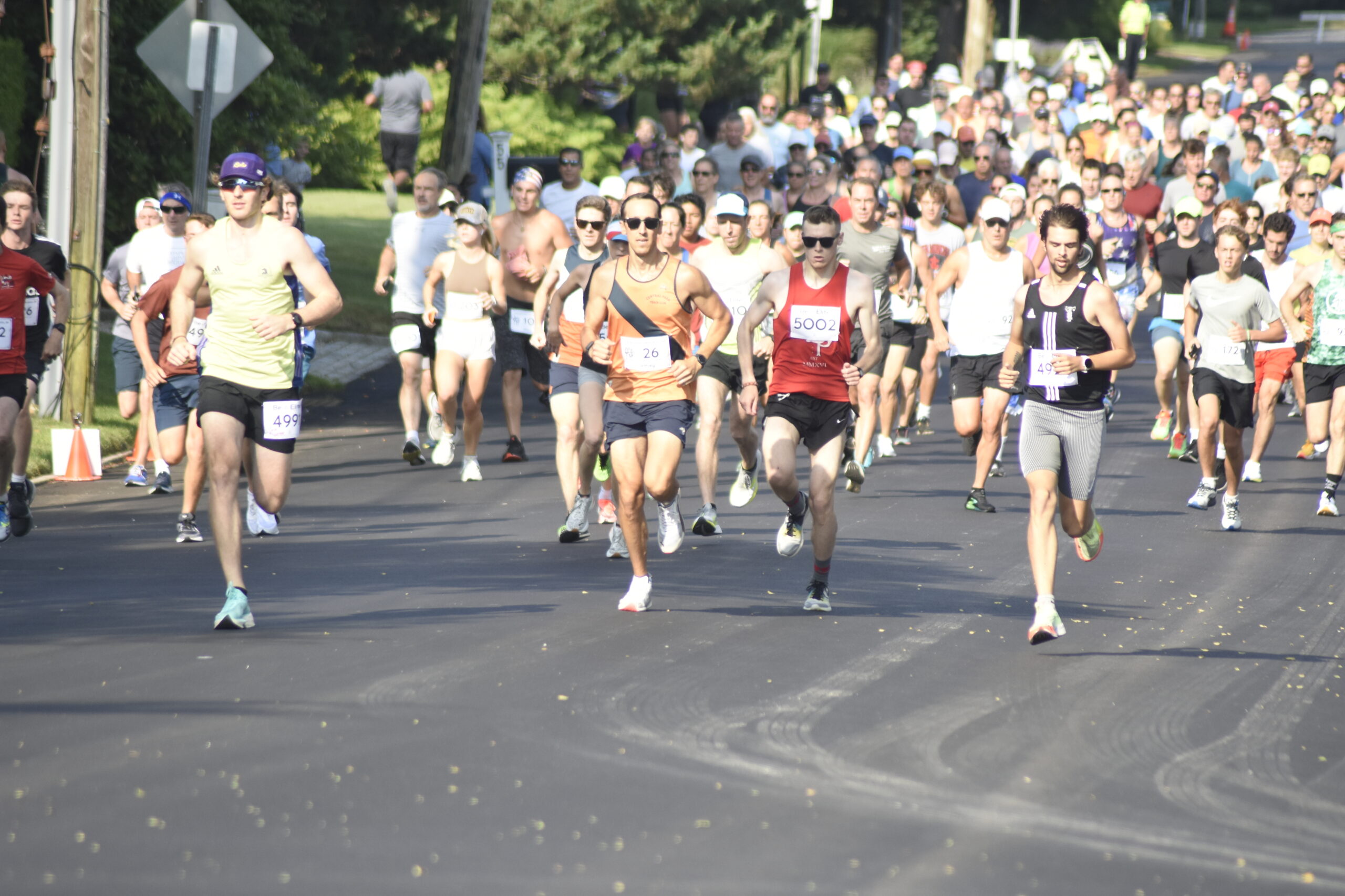 Runners start the 30th live running of the Joe Koziarz Memorial 5K in Westhampton Beach on Saturday morning.    DREW BUDD