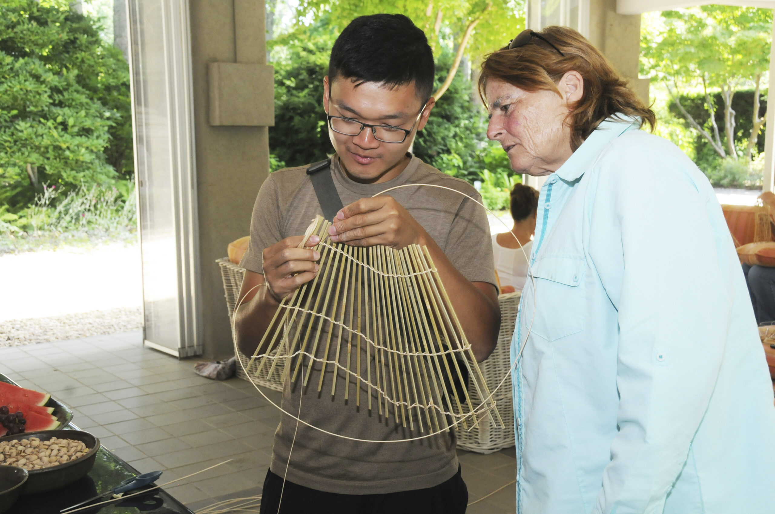 Eden Liu and Kathy Henderson in the Pavilion at LongHouse Reserve in East Hamptonon on July 14. Artist Cheng Tsung Feng and his staff taught the workshop to celebrate the newest installation of artworks from Asia, 