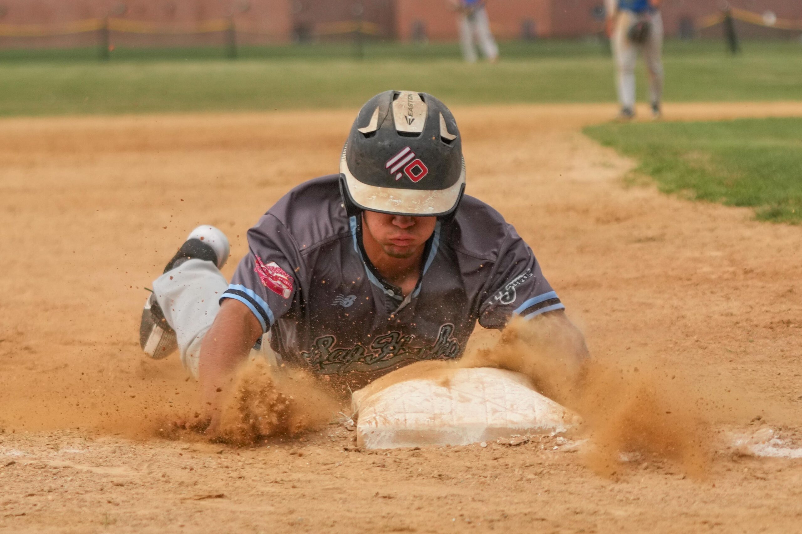 Sag Harbor's Cam Santerre steals third base, one of four stolen bases in the game for the Rhode Island product.  RON ESPOSITO
