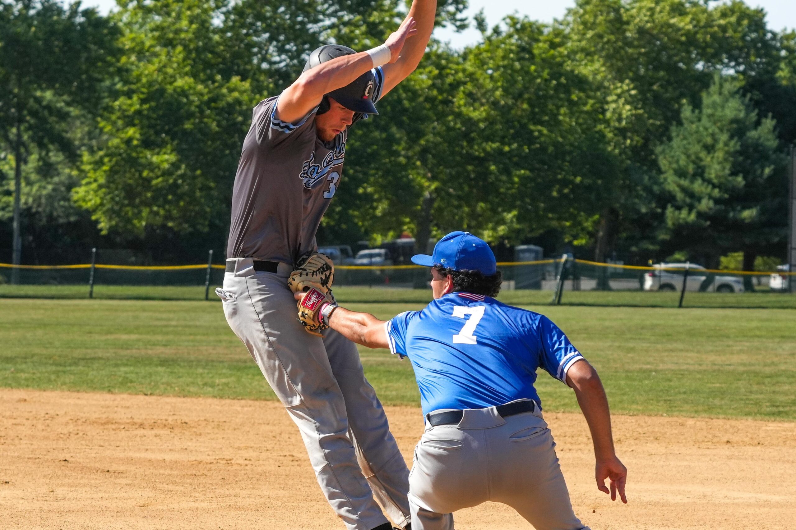 Southampton first baseman Luke Fisher (Villanova) tags Sag Harbor's C.J. Dean (Cincinnati).   RON ESPOSITO