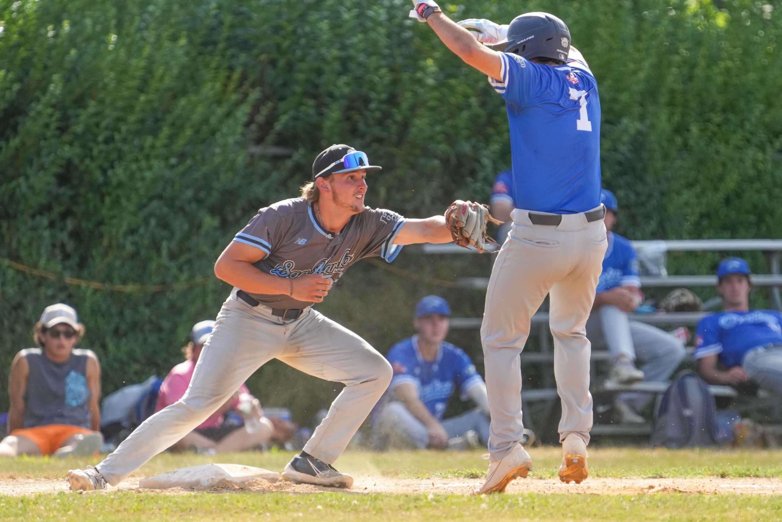 Sag Harbors D.J. Perron Jr.  (UMass-Dartmouth) goes to tag out Southampton's Luke Fisher (Villanova).   RON ESPOSITO