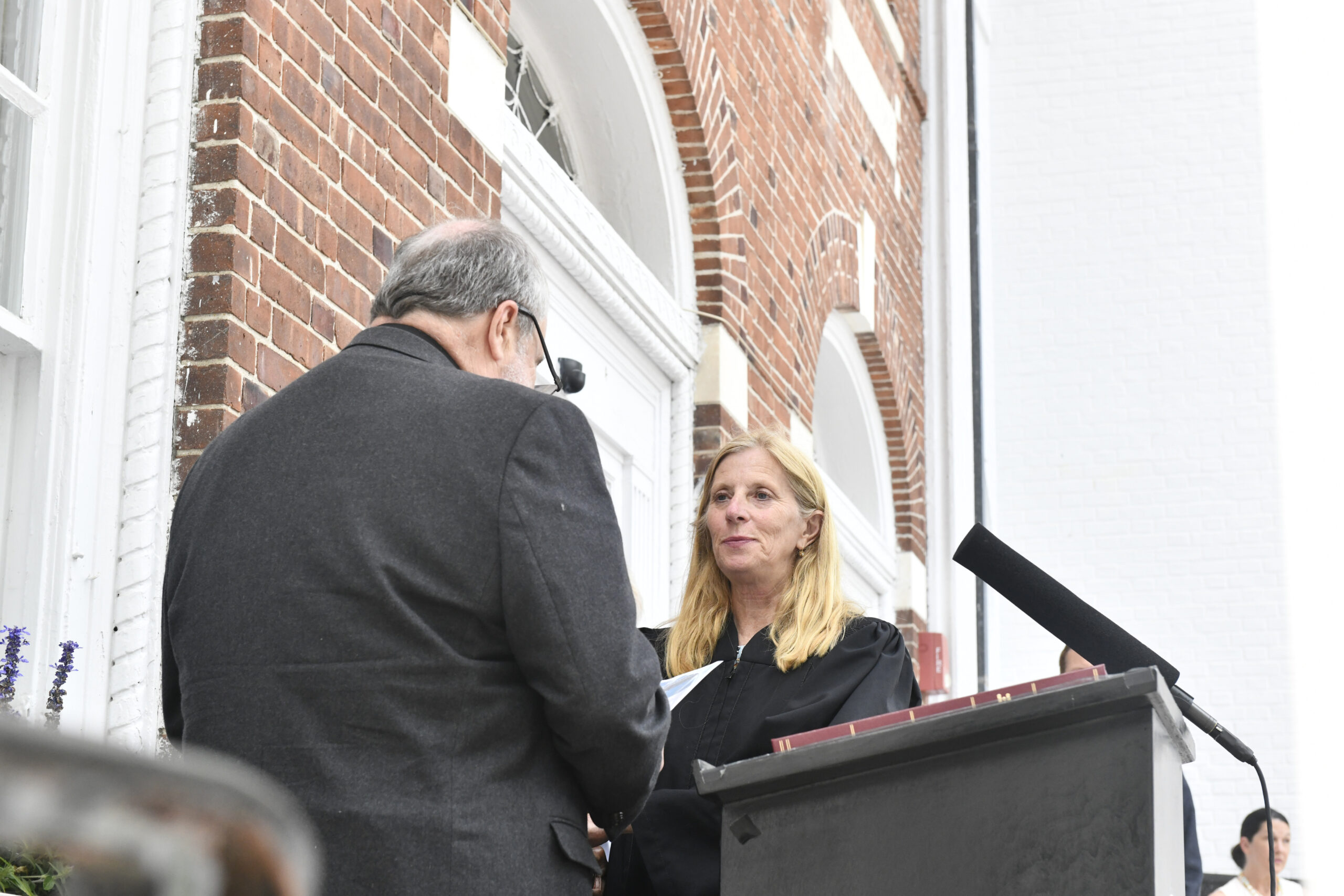 Justice Barbara Wilson takes the oath of office.