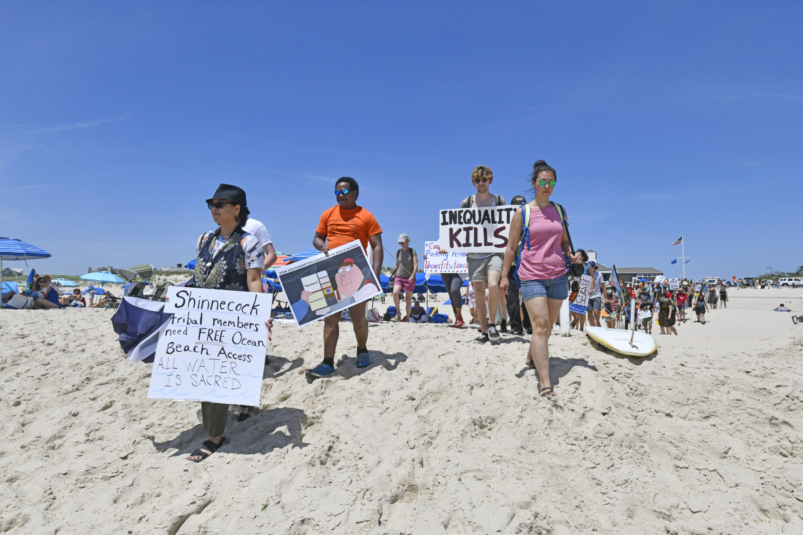 Members of the Shinnecock Nation hosted a #beachback protest at Coopers Beach on Saturday afternoon to demand that the Southampton Village Board give free beach access to tribal members.     DANA SHAW