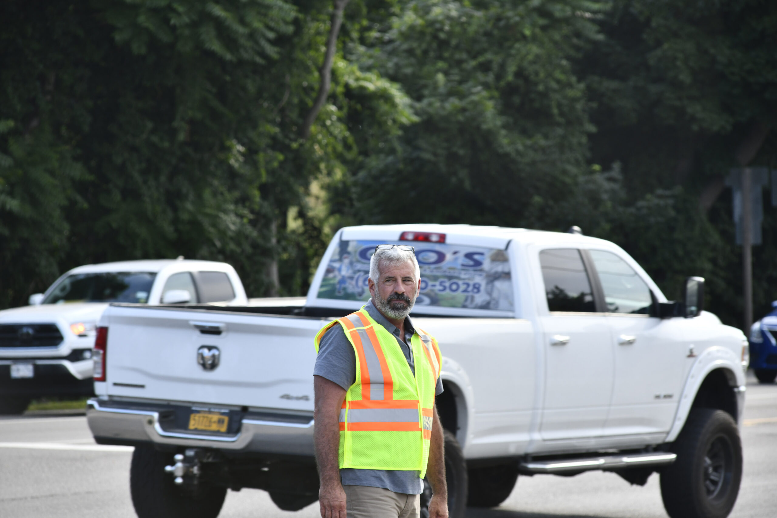 Southampton Town Highway Superintendent Charles McArdle at the Tuckahoe Road intersection on July 15, overseeing the effort to improve morning traffic flow on County Road 39 in Southampton.   DANA SHAW