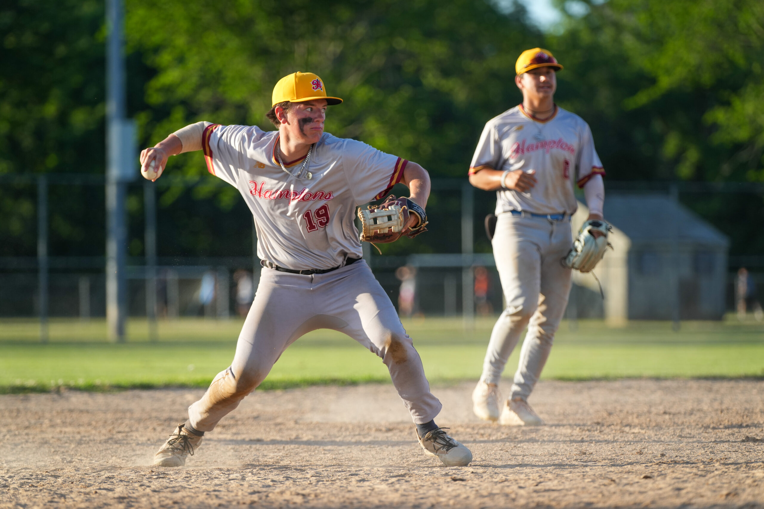 Gold Team All-Star Matt Shuhet (North Fork/Iona) looks to throw to first base after fielding a ground ball.  RON ESPOSITO