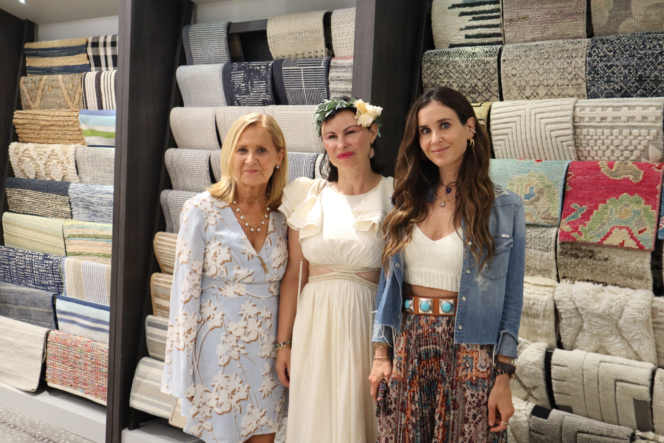 From left, Hilary Cosgriff, designer of Hampton Fabric and Blinds, Elsa Soyars, designer of Elsa Soyars Interiors, and Ashley Stark, the creative director of Stark stand in front of the Stark Collection. MEGAN NAFTALI
