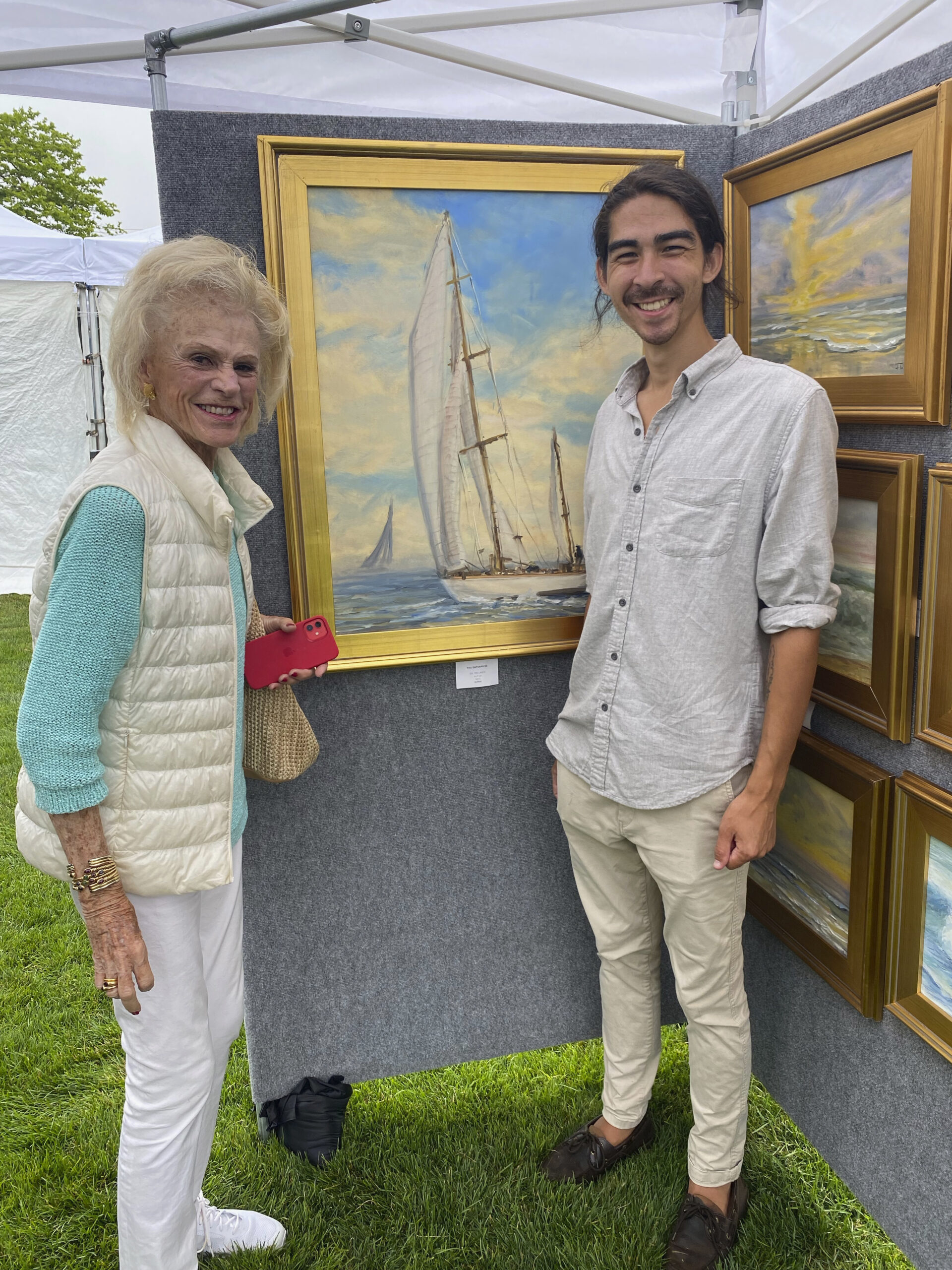 Susie Wagner and Artist John Tuttle at the Fair in Agawam Park.  GREG D'ELIA