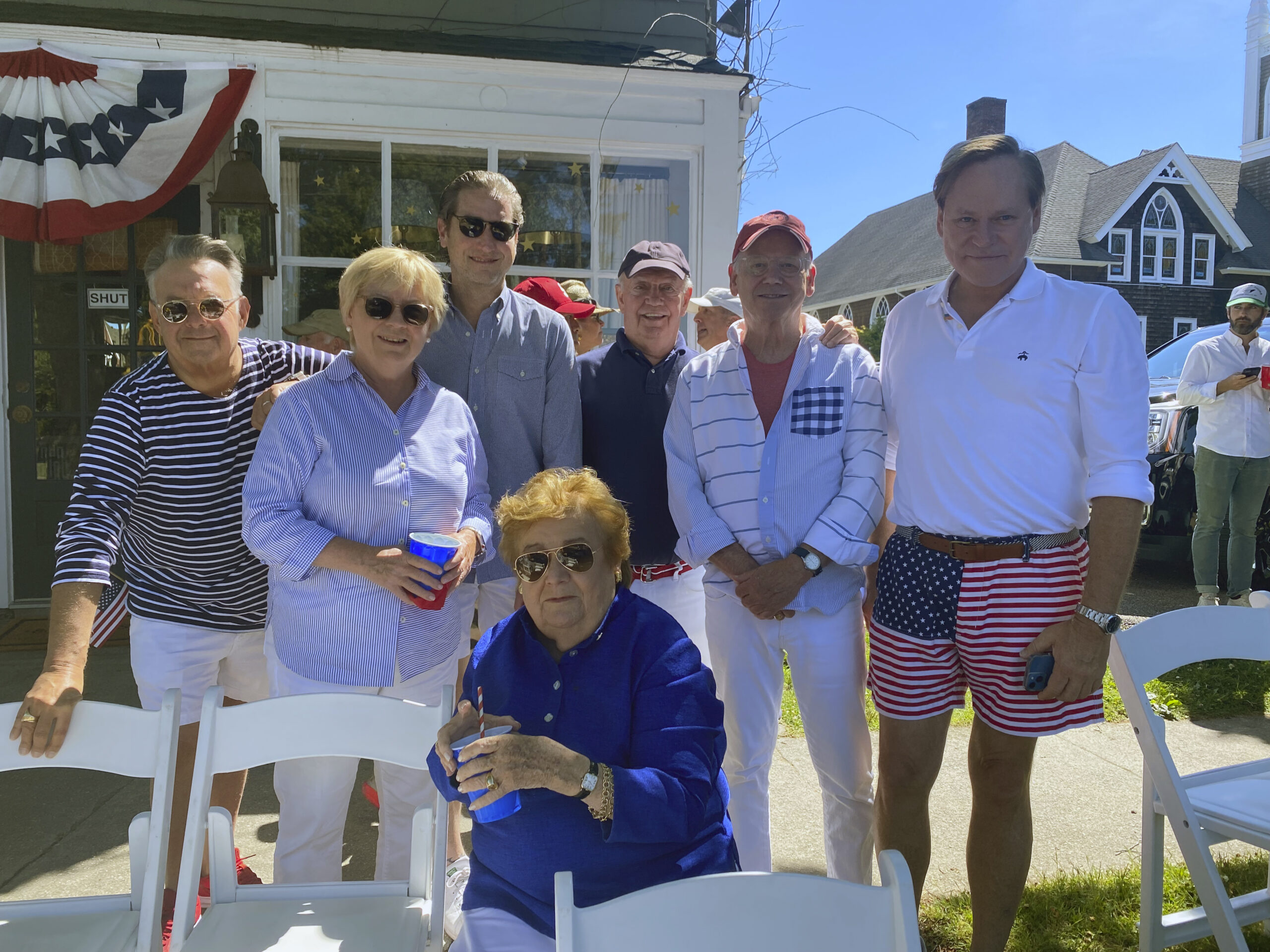 The gang watching the July 4 parade arade in front of Design House.   GREG D'ELIA