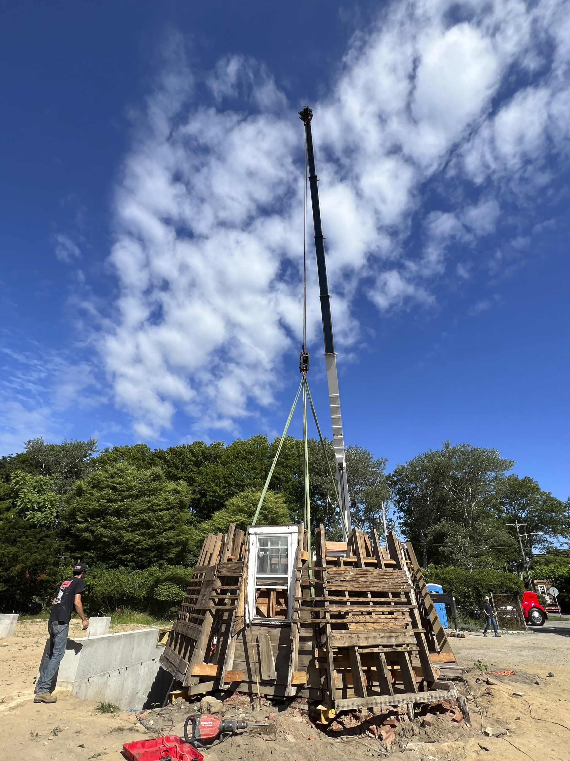 The crew from Dawn prepares to move the last section of the windmill.  DANA SHAW