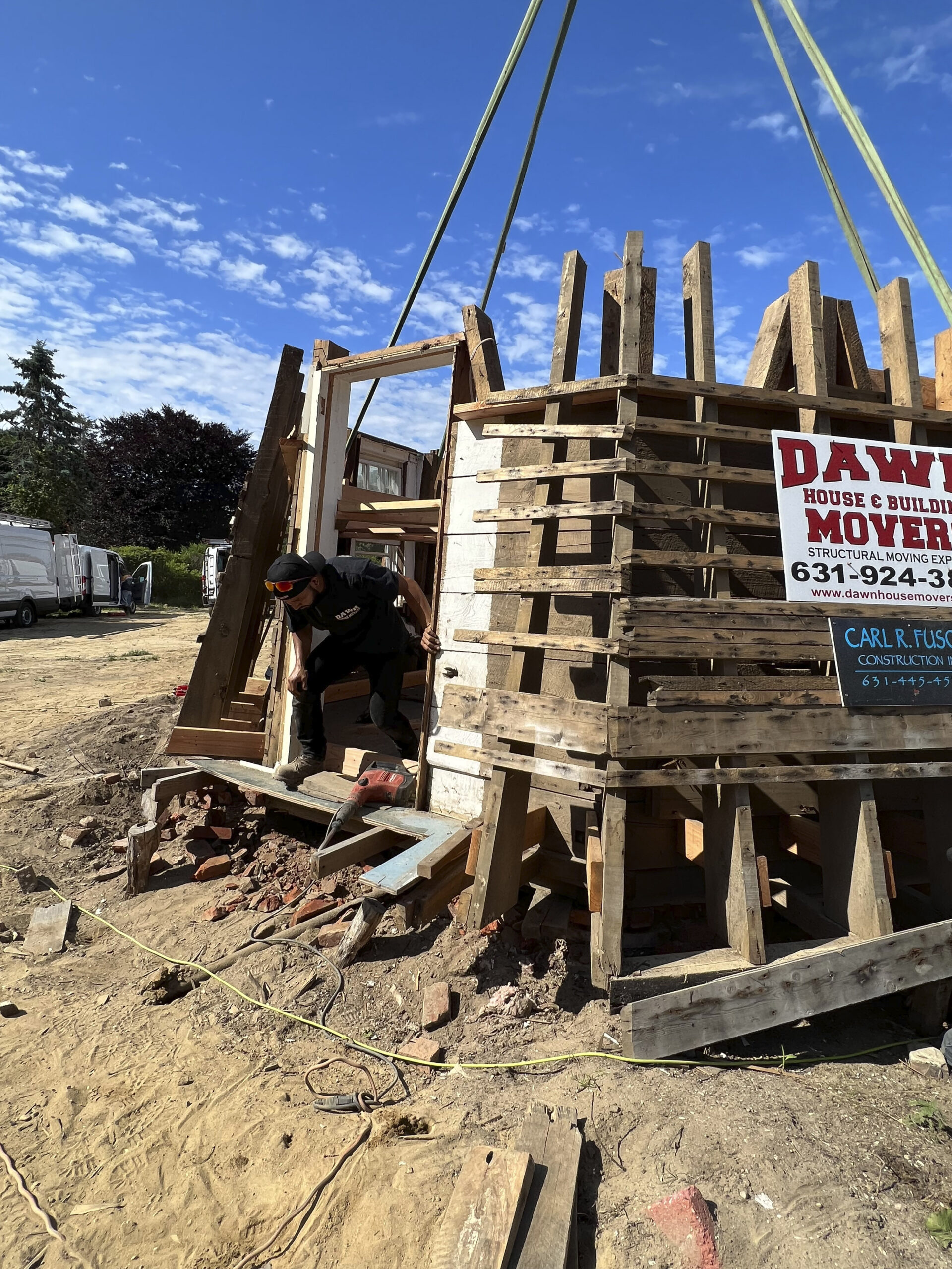 The crew from Dawn prepares to move the last section of the windmill.  DANA SHAW