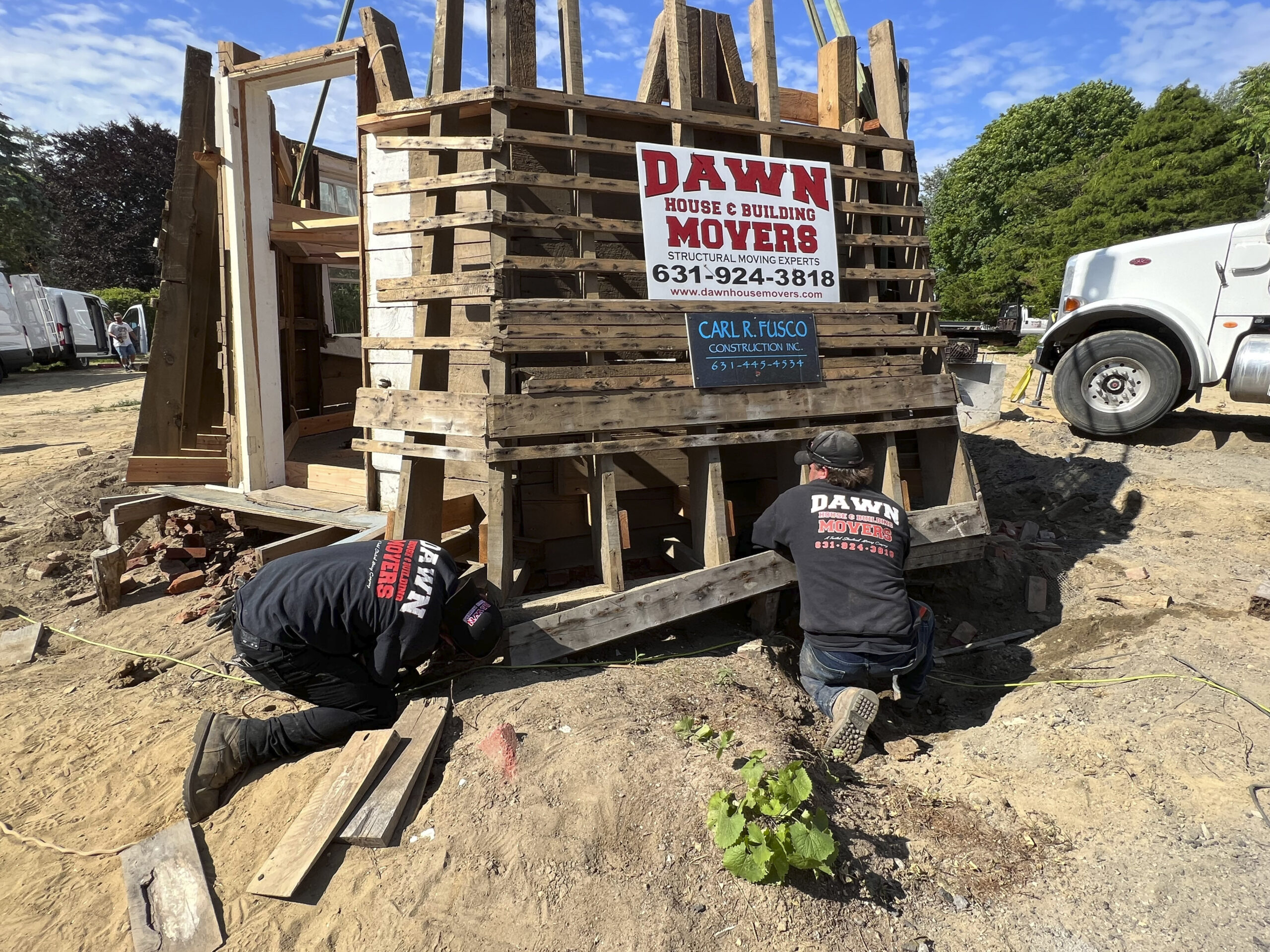 The crew from Dawn prepares to move the last section of the windmill.  DANA SHAW