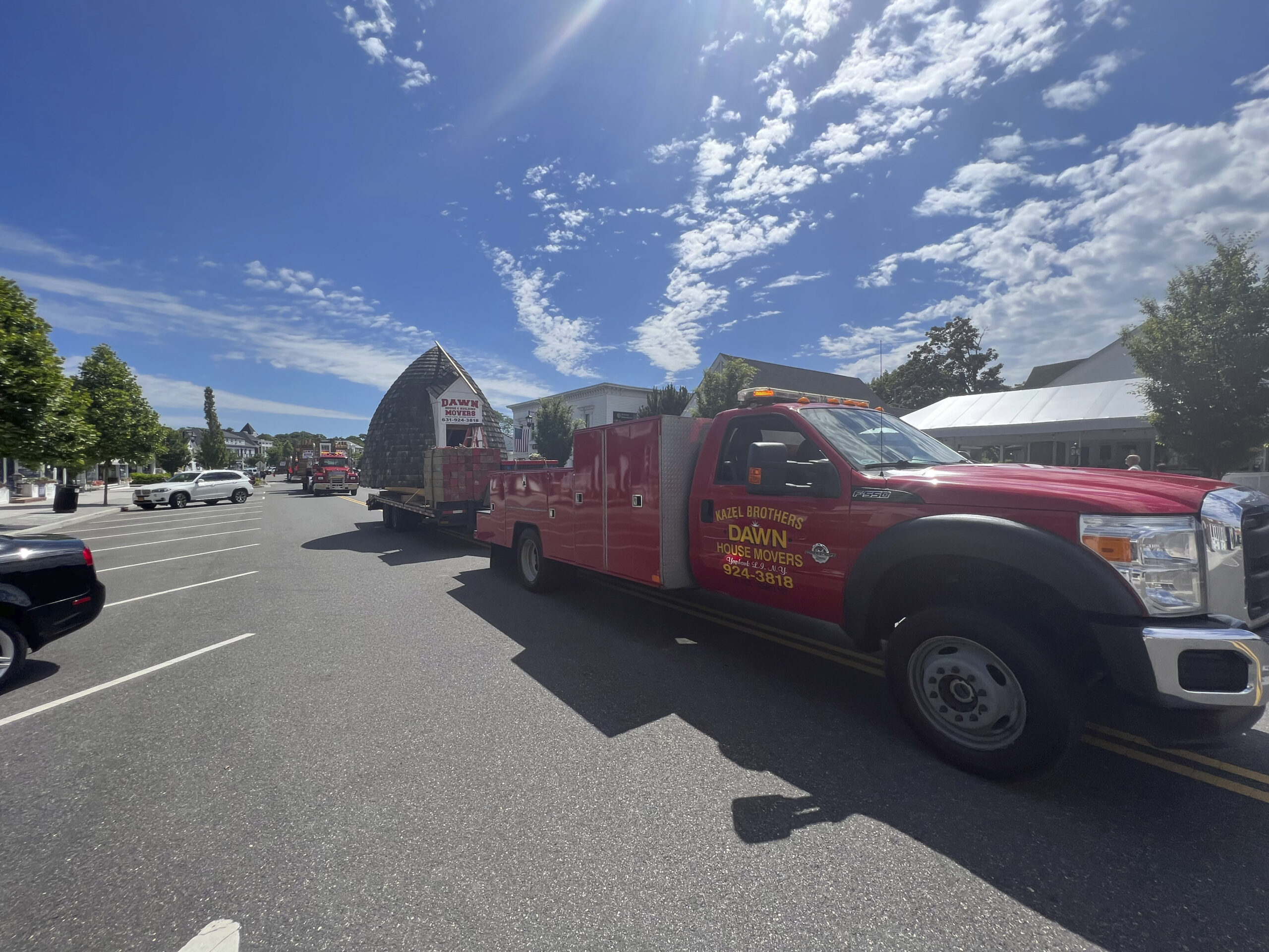 The trucks make their way down Main Street to the Great Lawn.   DANA SHAW