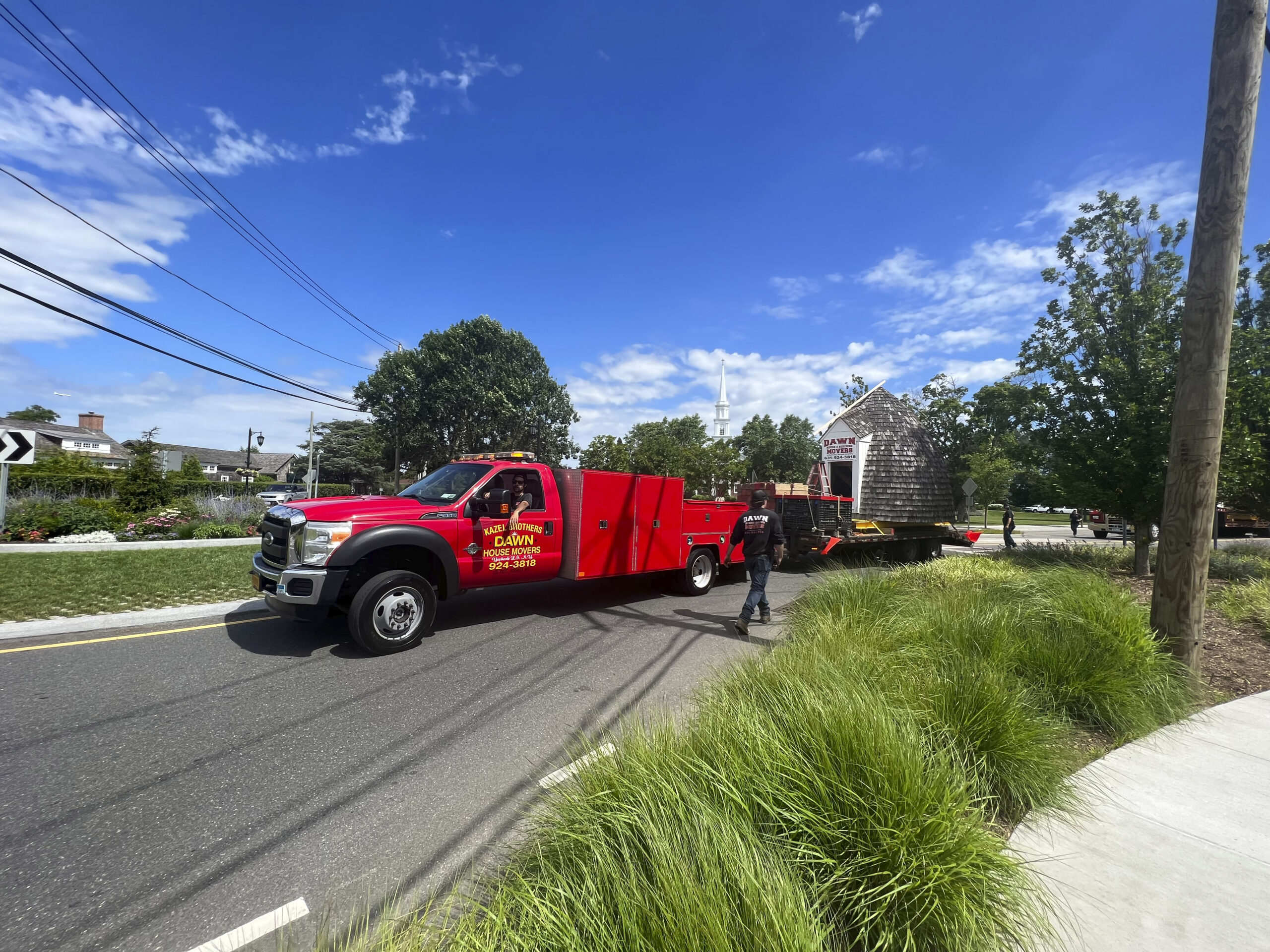 The trucks make their way down Main Street to the Great Lawn.   DANA SHAW