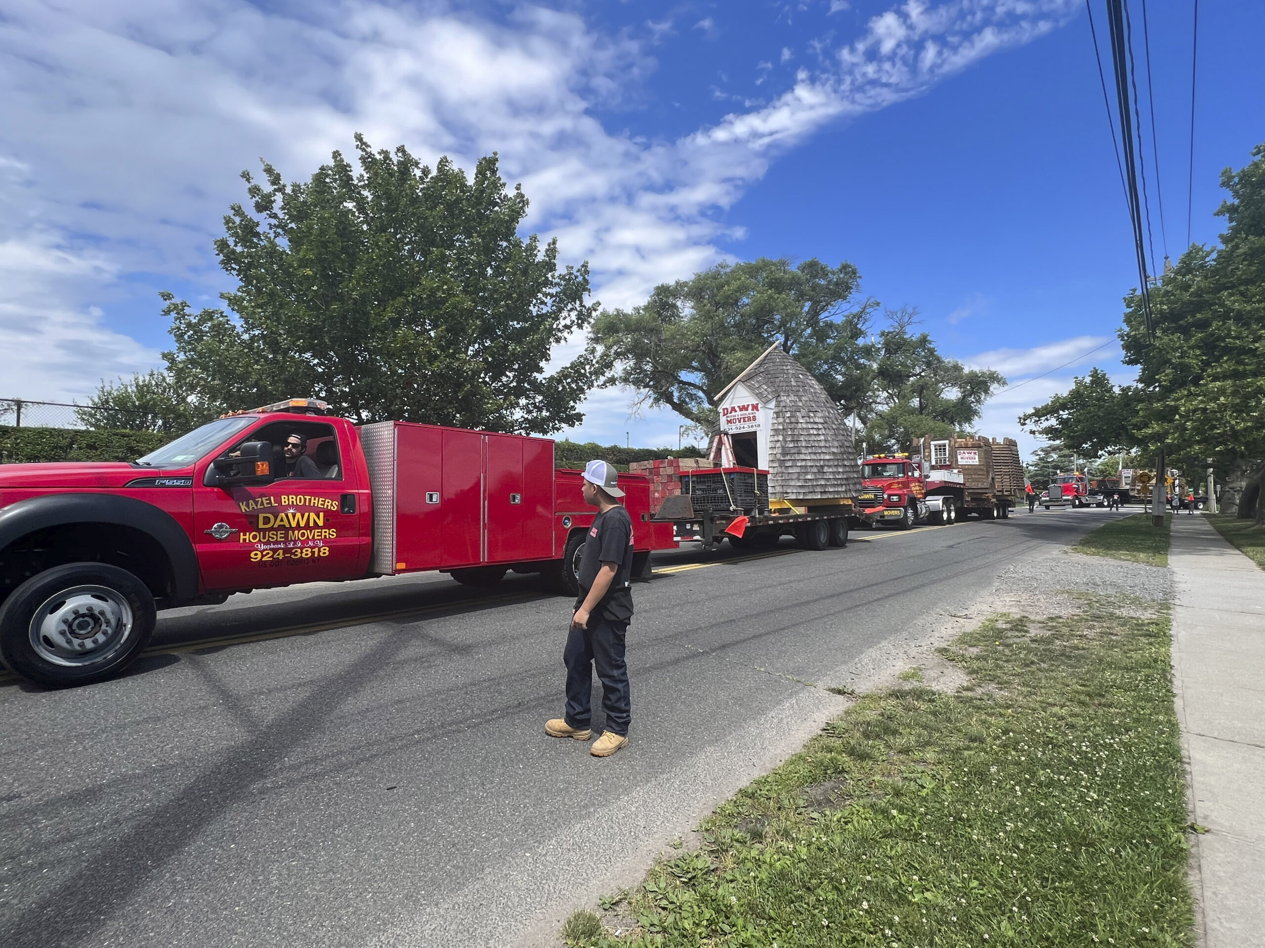 The trucks make their way down Main Street to the Great Lawn.   DANA SHAW