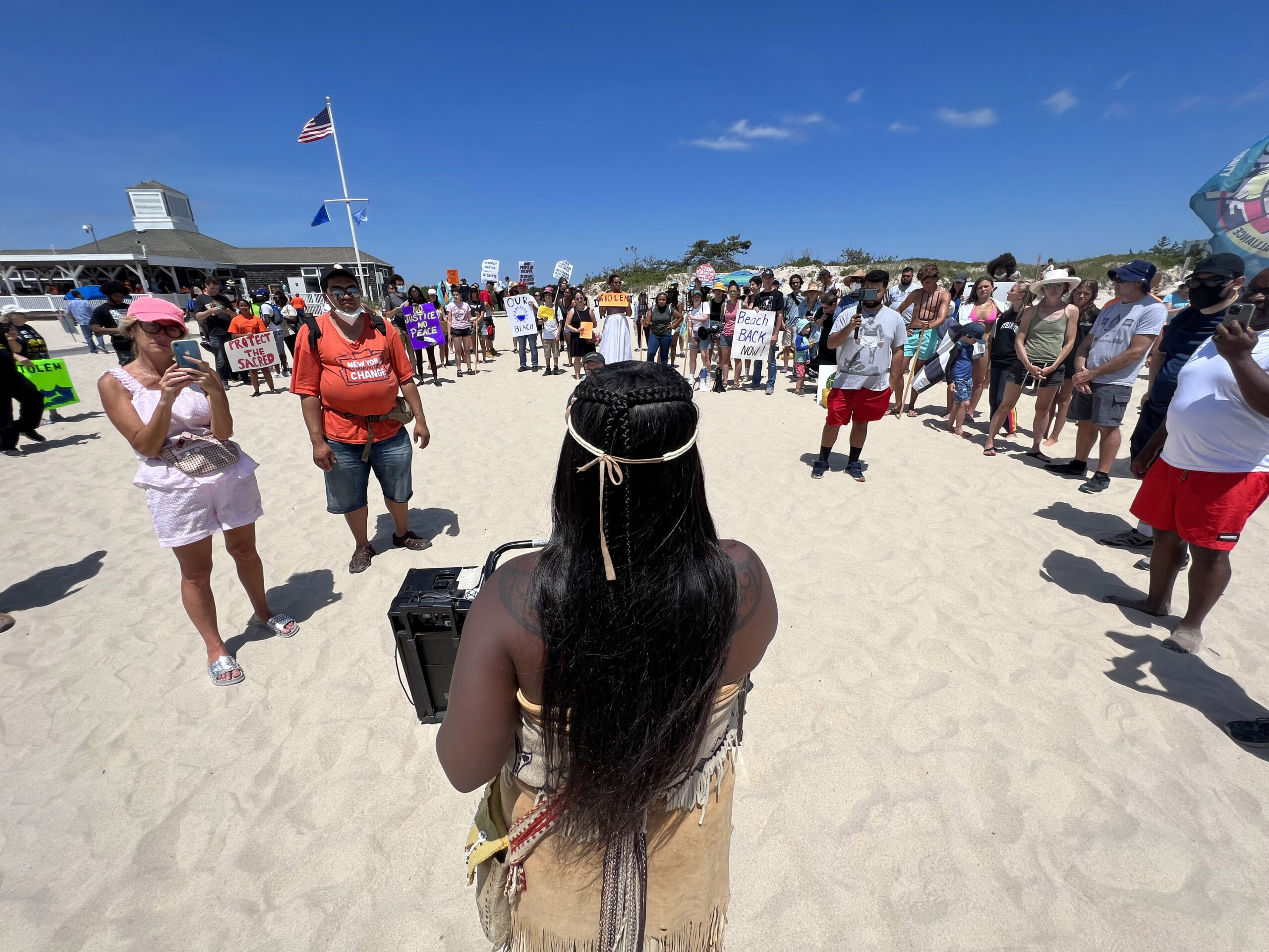 Chenae Bullock addresses the crowd at Coopers Beach on Saturday afternoon.  DANA SHAW