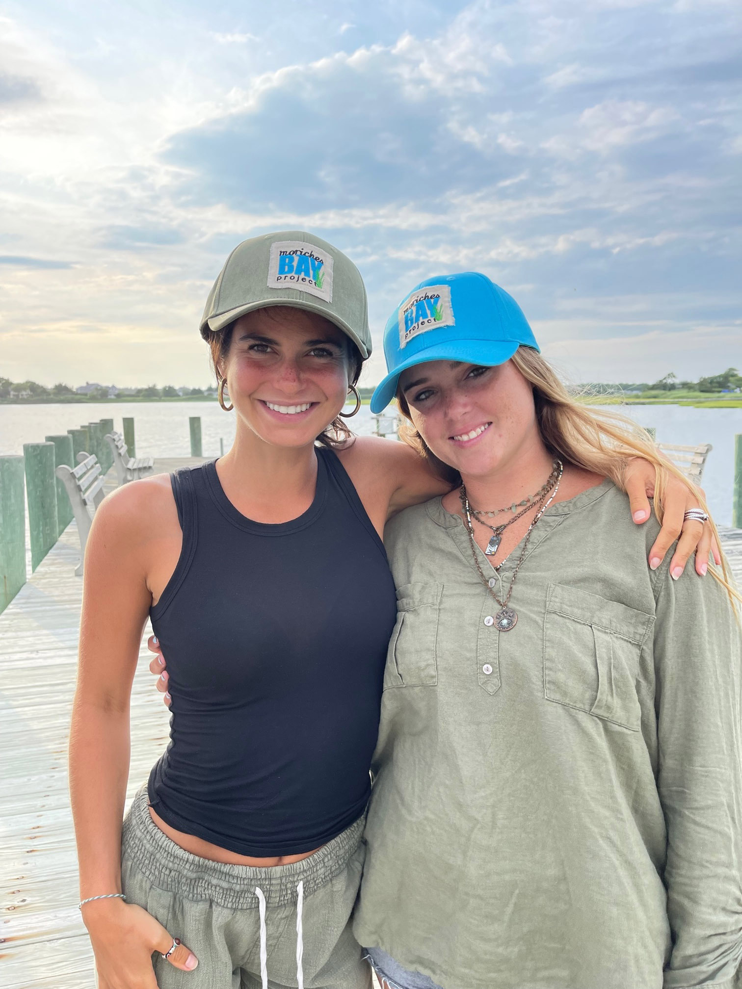 Allie Mirsky and Leah McLaughlin at the Moriches Bay Project's Summertime Cocktails at the Quogue Dock event to celebrate the new  Floating Upwelling System at the dock and to thank the Quogue community and sponsor, relic.    COURTESY MORICHIES BAY PROJECT