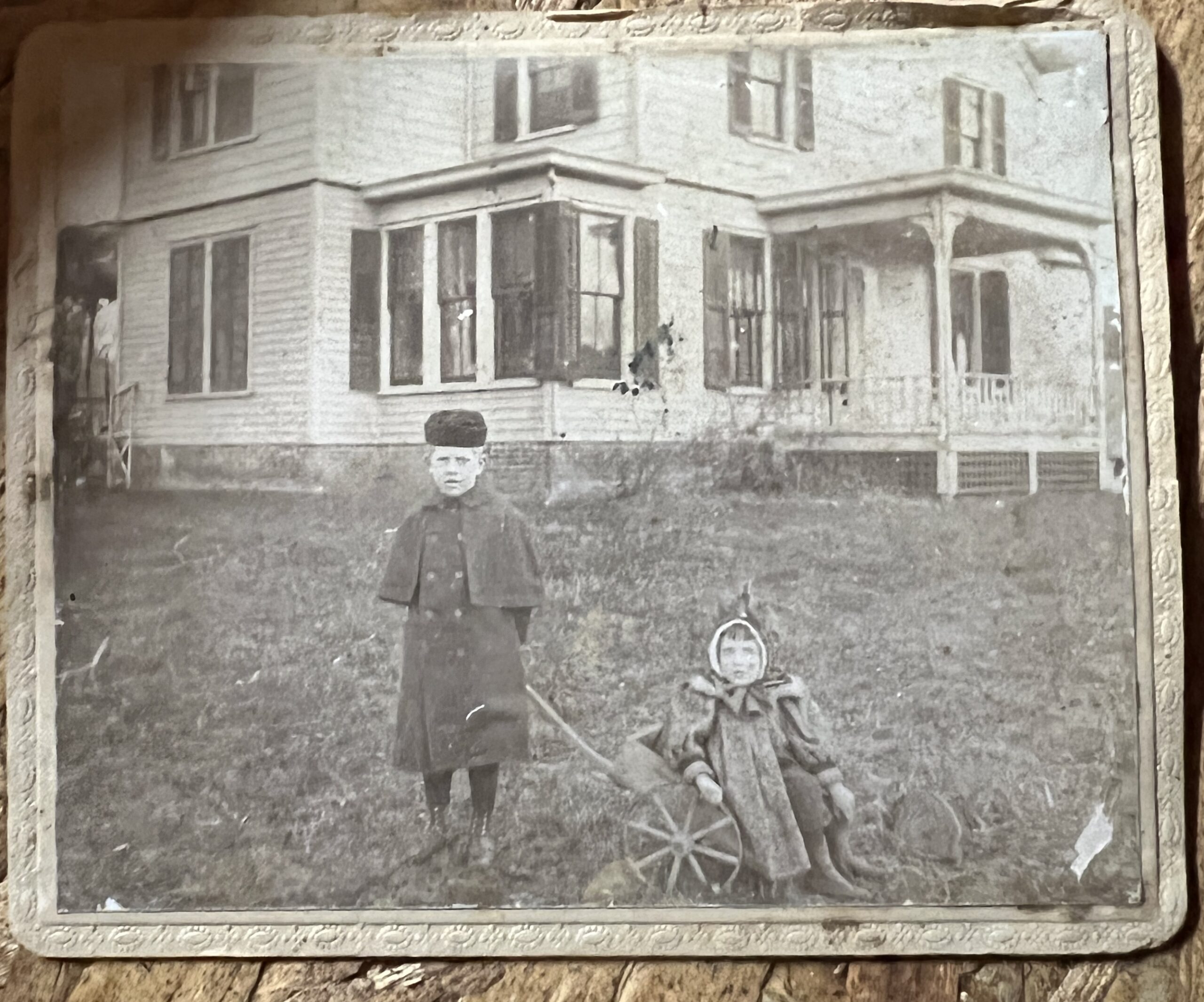 C. Edwin Dimon and his sister Katheryn in front of the Dimon Farmhouse in the 1890s. COURTESY CHRIS DIMON