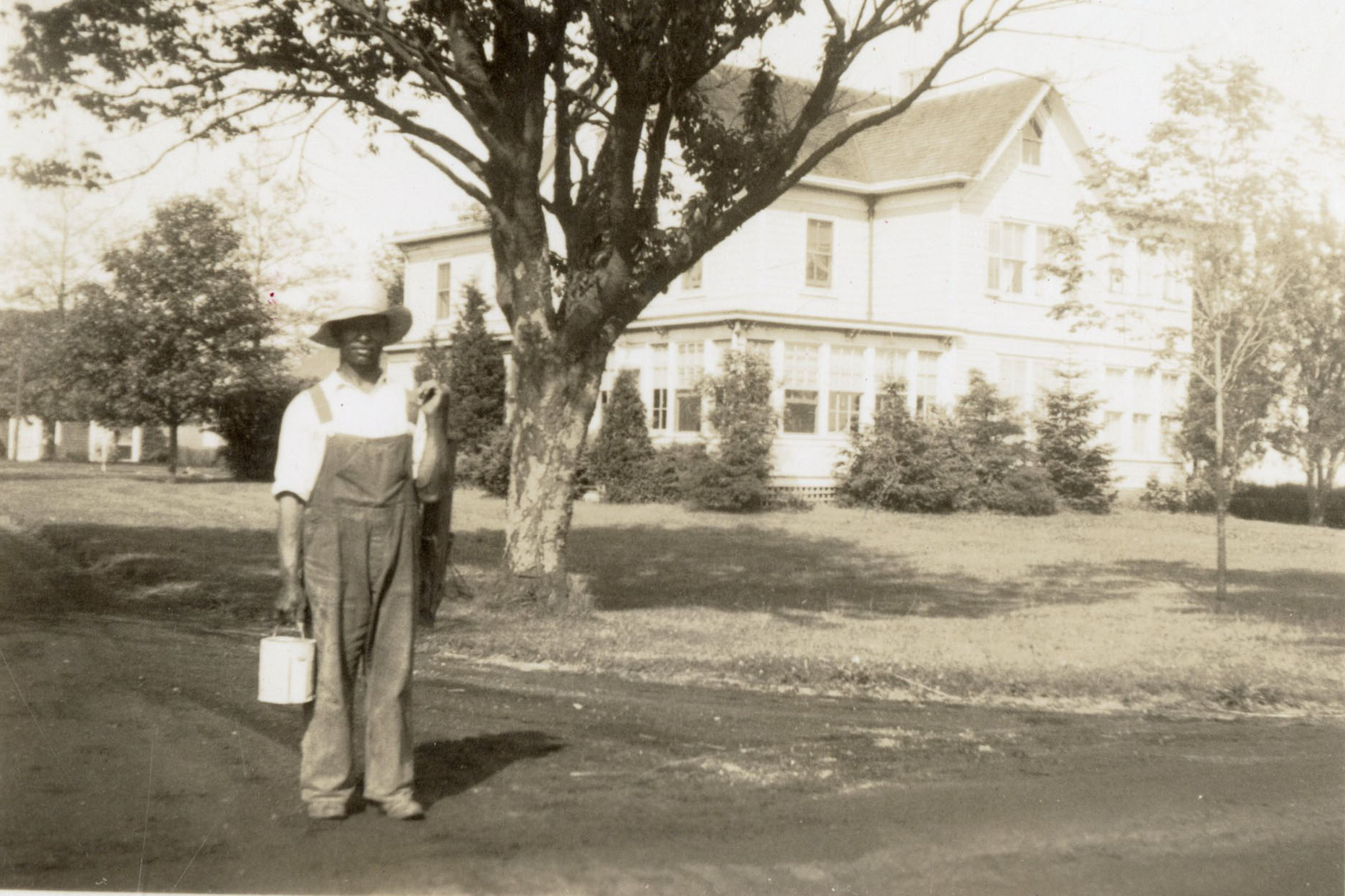 An unidentified man out front of the Dimon farmhouse in the 1950s or 1960s.  COURTESY CHRIS DIMON