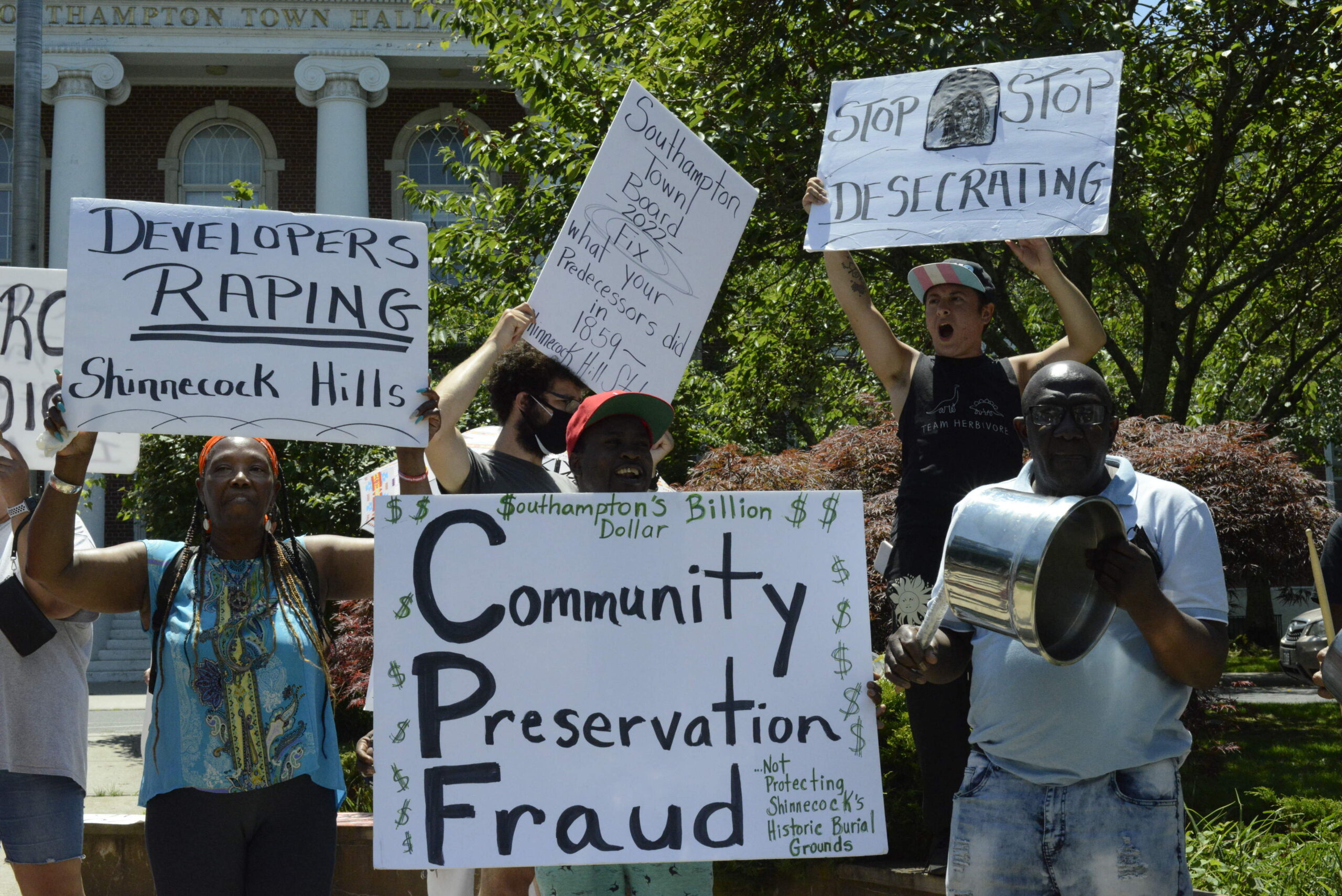 Protestors demanded that Southampton Town use the Community Preservation Fund to protect sacred Shinnecock land. JULIA HEMING