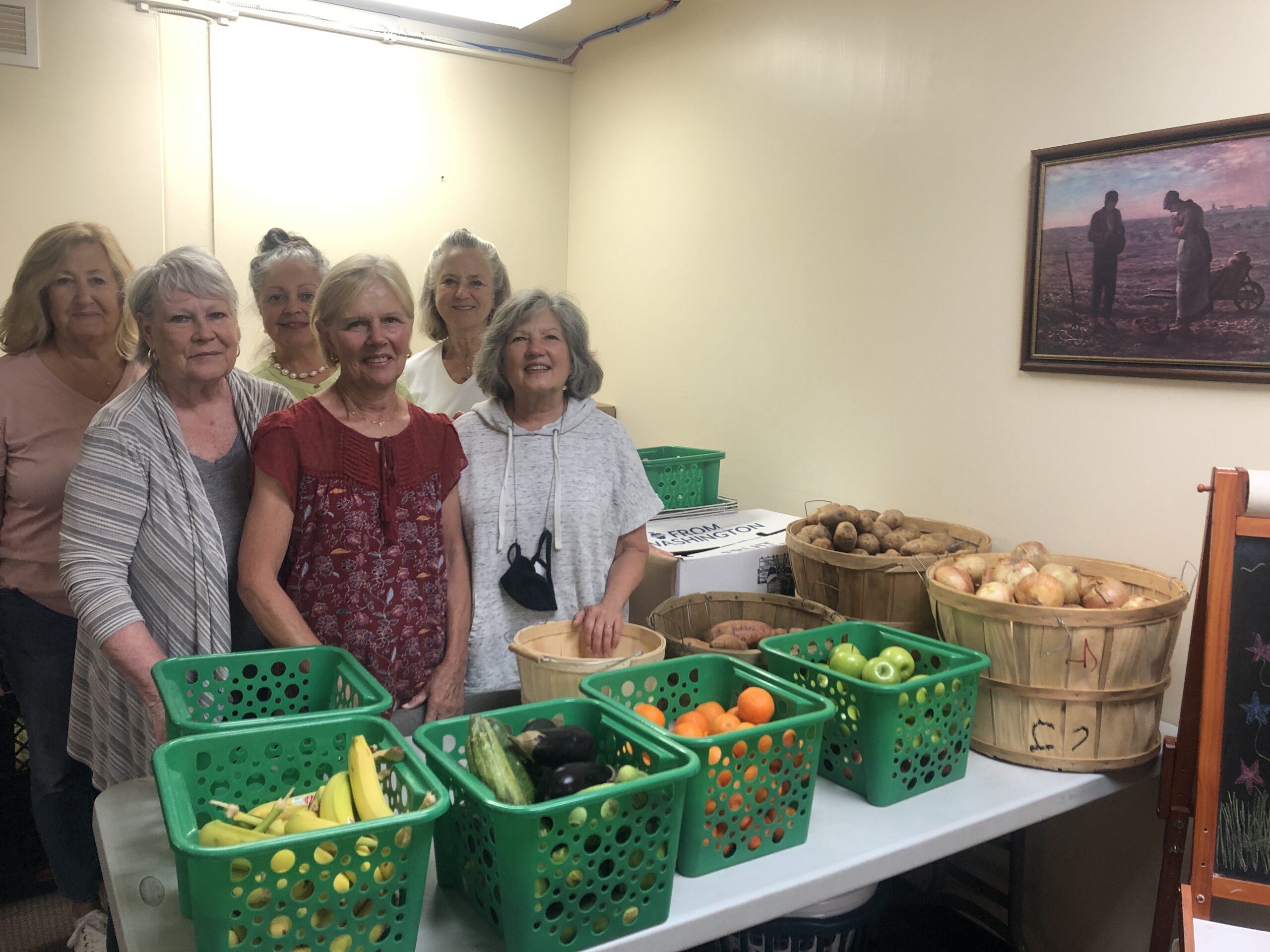 Volunteers were at work filling out grocery lists earlier this week at the food pantry at St. Rosalie's Church in Hampton Bays. CAILIN RILEY PHOTOS