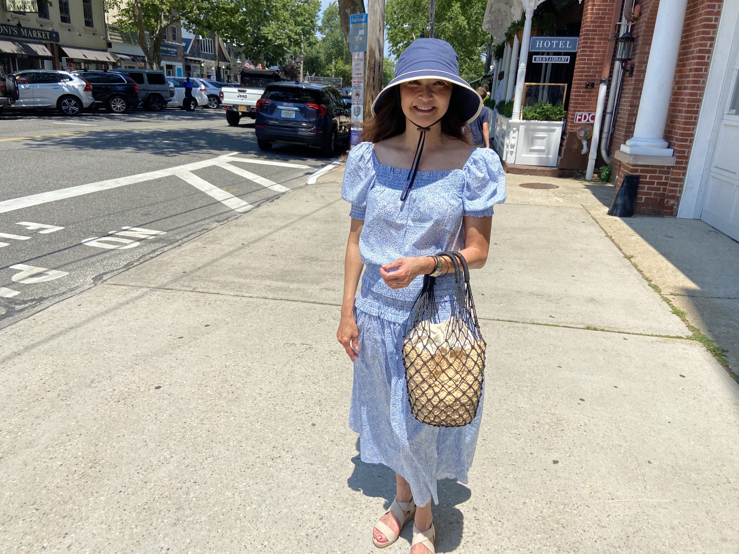 BY JULIA HEMIGN Lynn Chin with her straw bag in Sag Harbor.