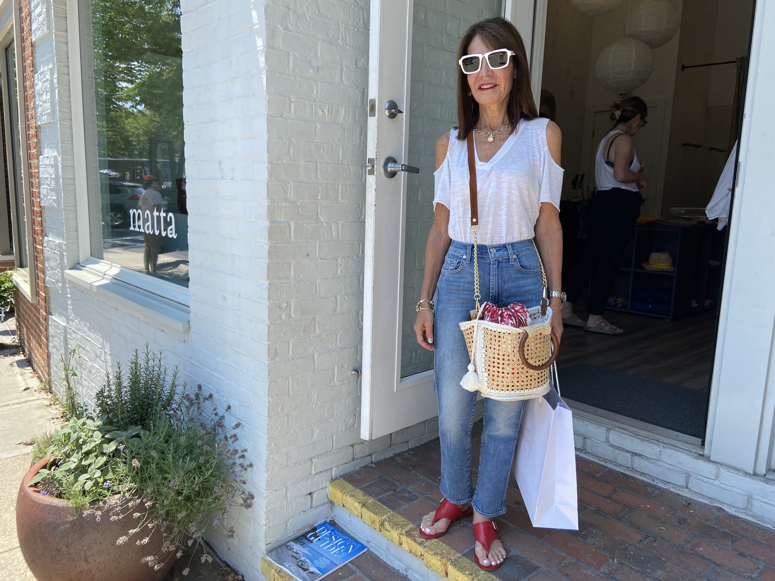 BY JULIA HEMING Shari Fine with her straw bag in Sag Harbor.