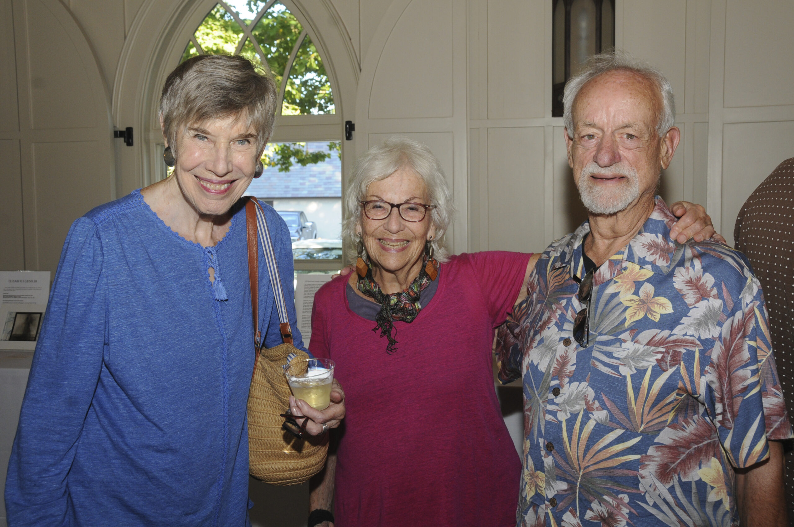 Catherine Crane, Julie Small-Gamby and Peter Gamby at the East End Hospice 21st annual Box Art Auction preview reception on August 24 at Hoie Hall at St. Luke's Church in East Hampton . Dozens of local artists contributed their vision and creation of 