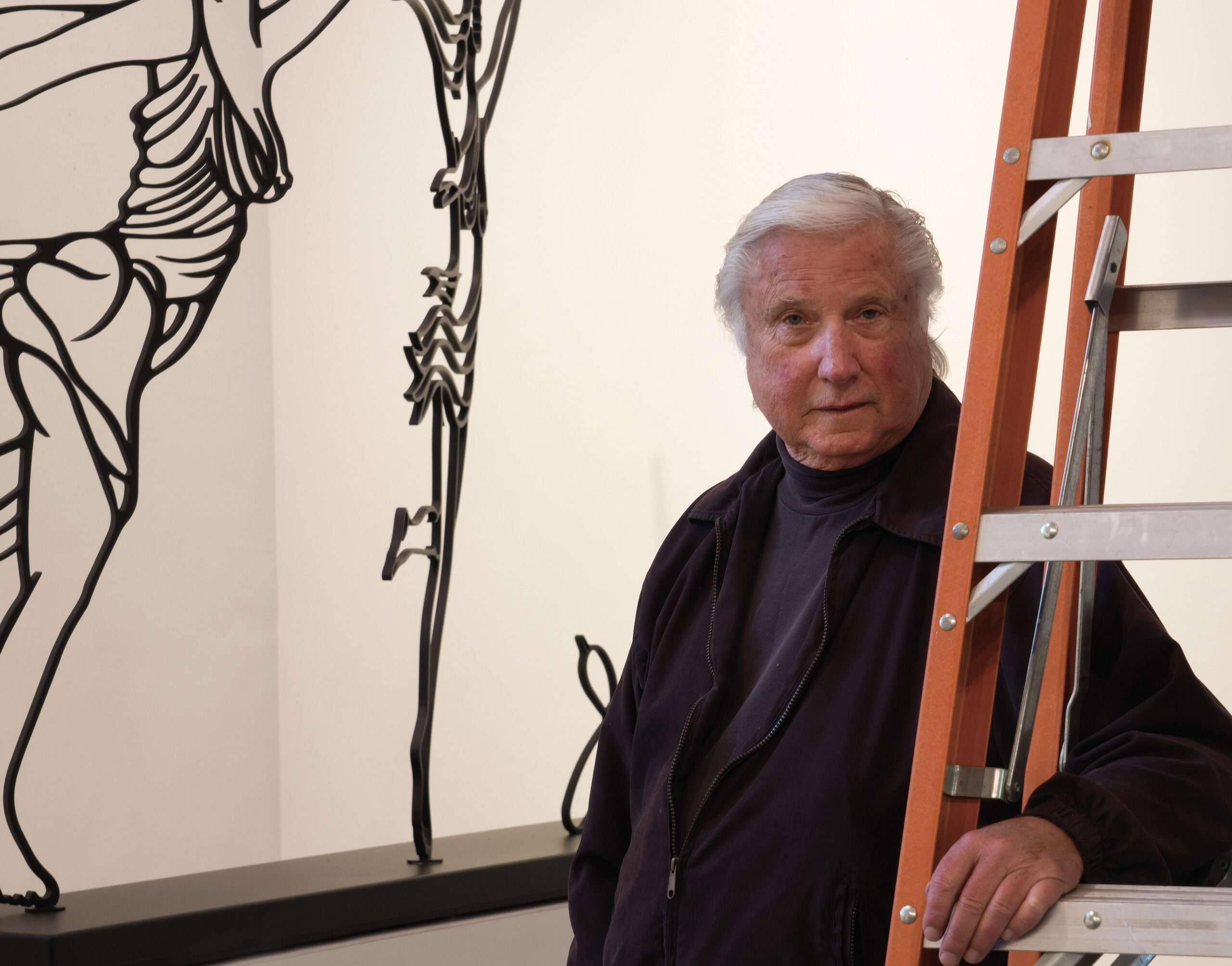 Artist Hal Buckner takes part in an August 21 panel discussion on the 