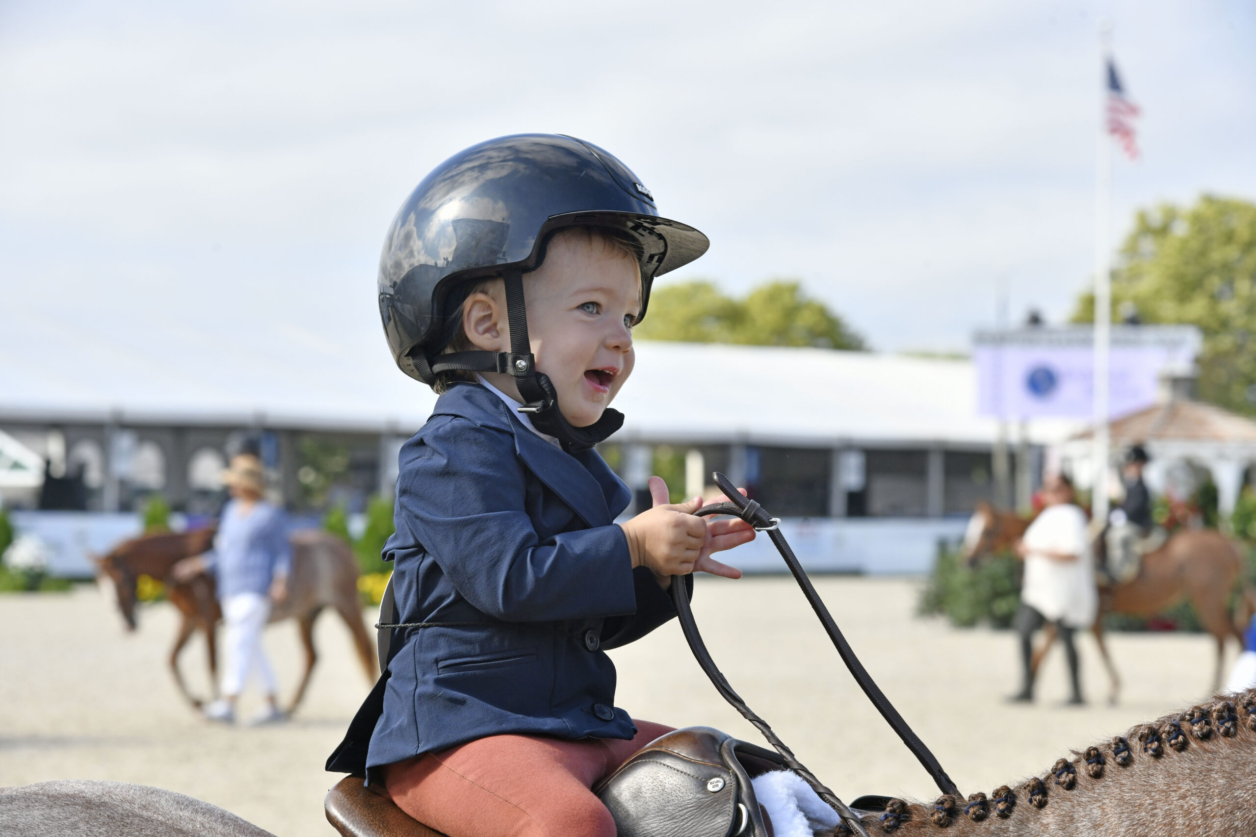 (#4) Riders compete in the  Leadline 2 to 4-year-old section on Sunday.  DANA SHAW