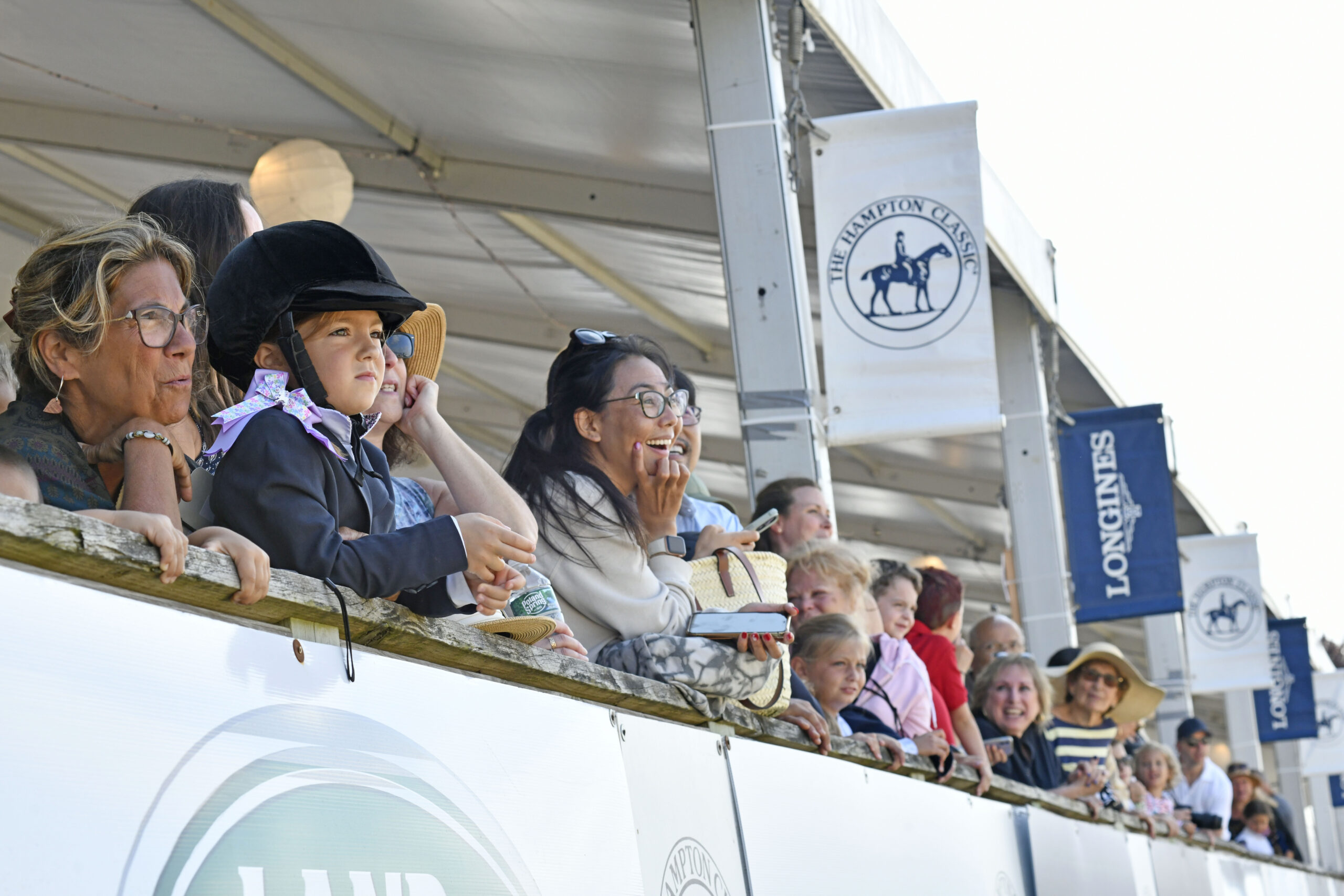 Spectators watch the Leadline 2 to 4-year-old section on Sunday.  DANA SHAW