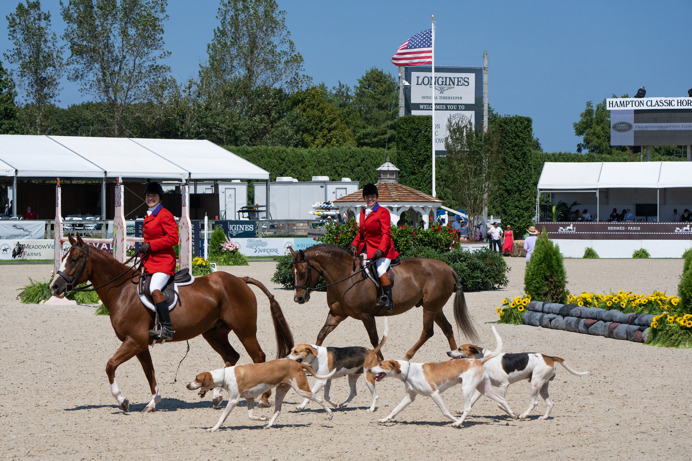 Members of the Smithtown Hunt, founded in 1900, were part of the Opening Day festivities on the newly revamped Grand Prix field on Sunday. LORI HAWKINS PHOTOS