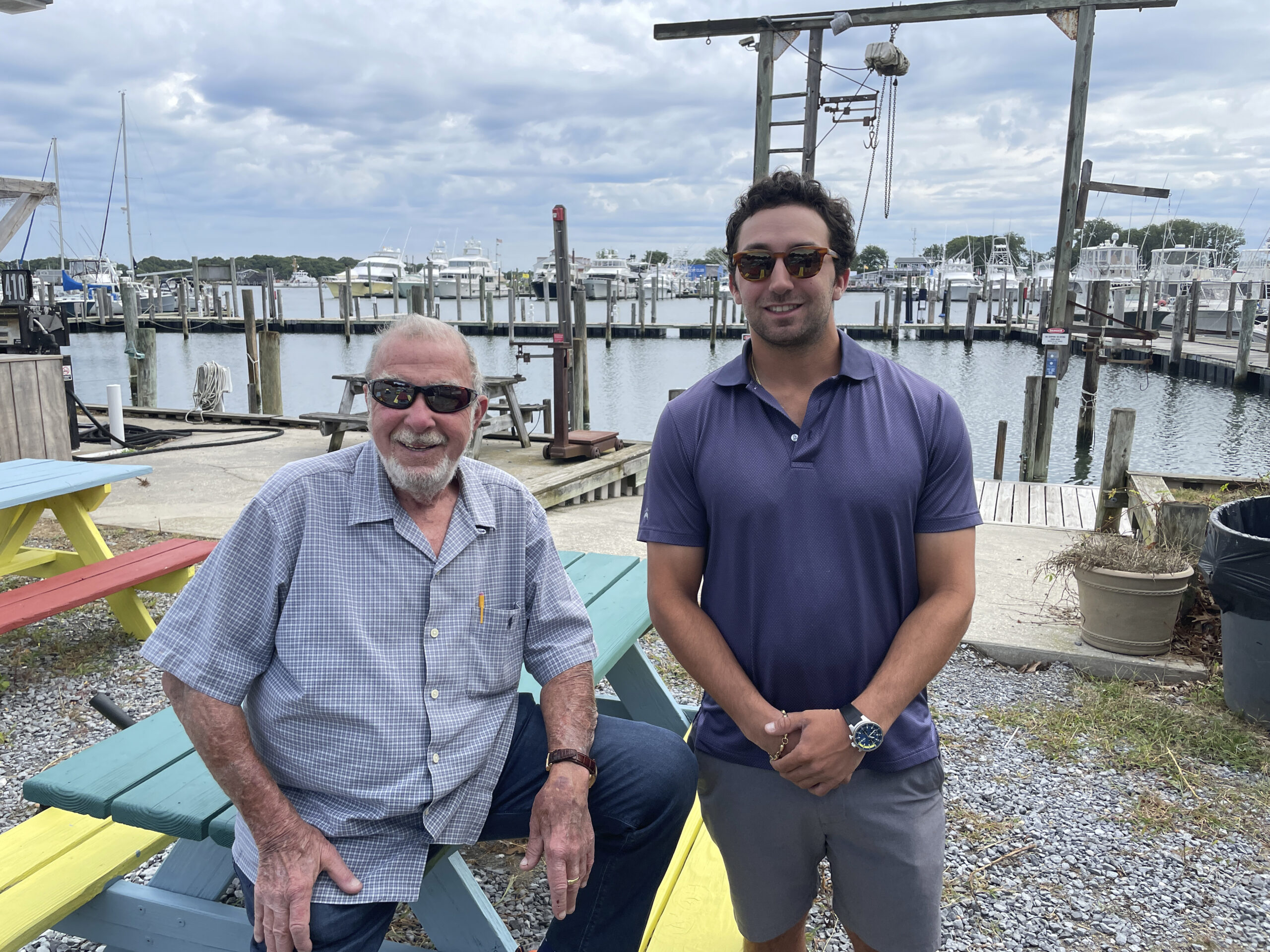 Sam Gershowitz and his grandson Alex Gershowitz, who is the general manager of Star Island Yacht Club, at the offshore sports Marina in Montauk, which Gershowitz purchased earlier this month.  MICHAEL WRIGHT