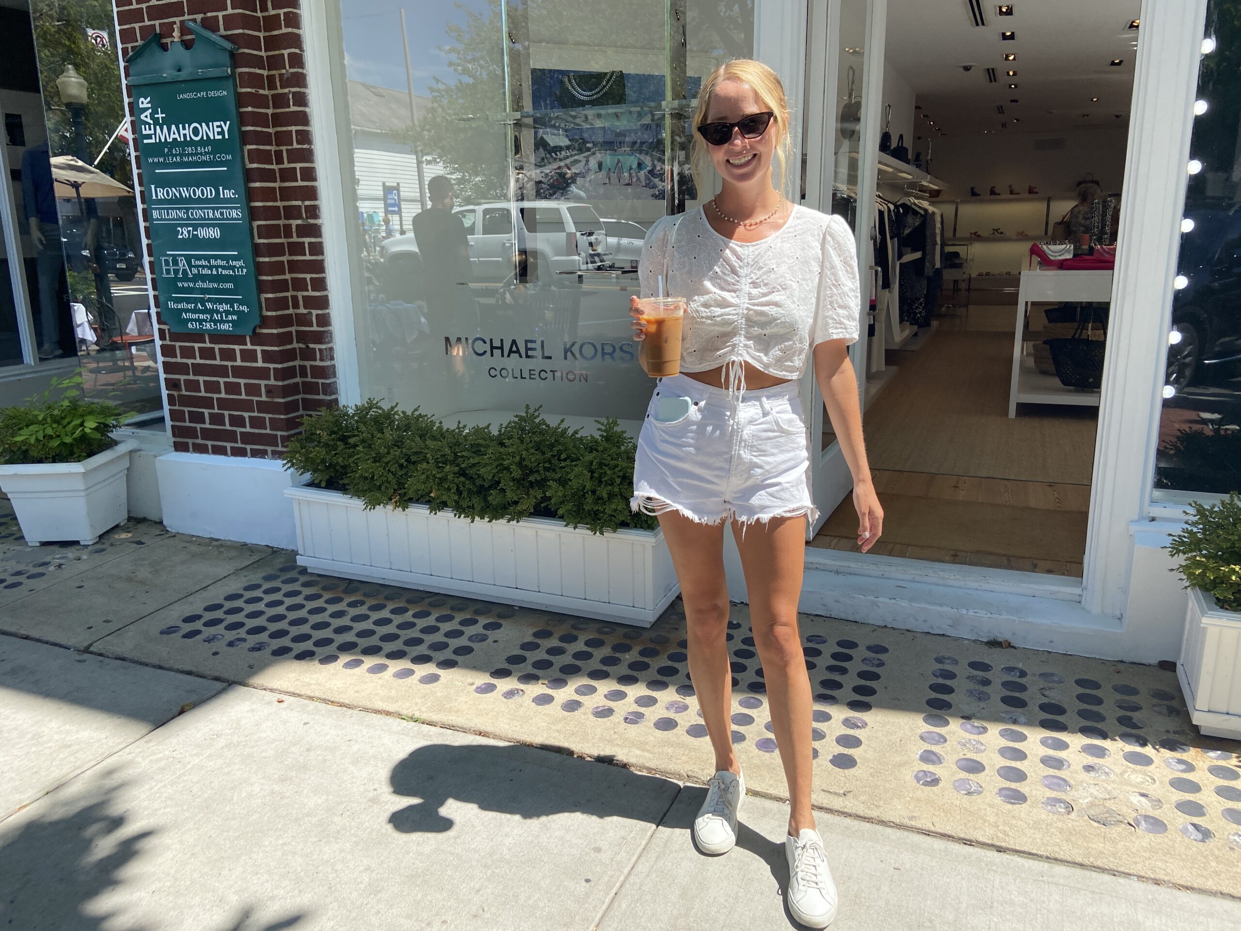 Ali Chilton donned an all white look while enjoying a coffee at St. Ambroeous in Southampton. JULIA HEMING