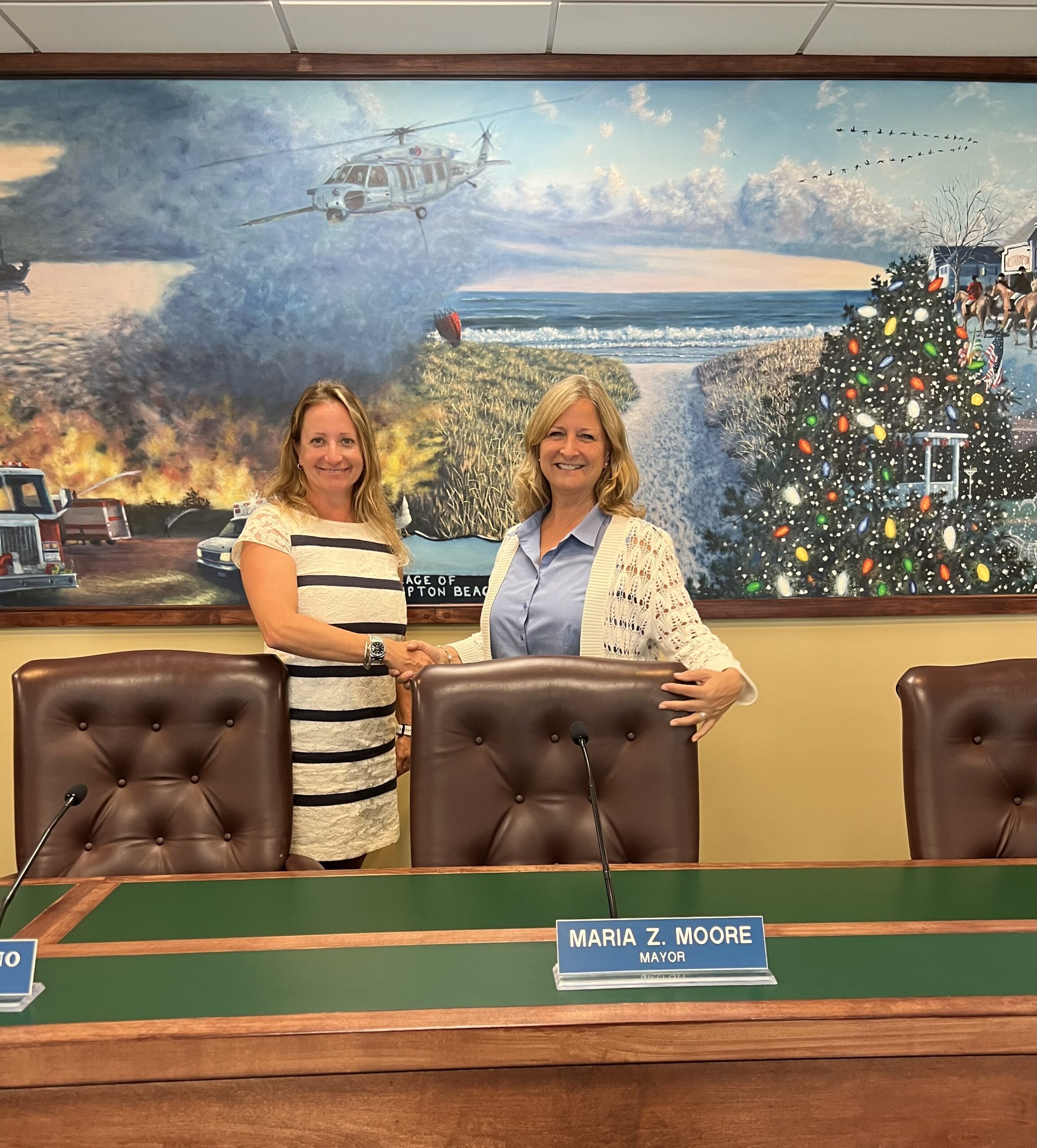 Westhampton Beach Village Planner Britton Bistrian and Mayor Maria Moore at a Village Board meeting on August 4.