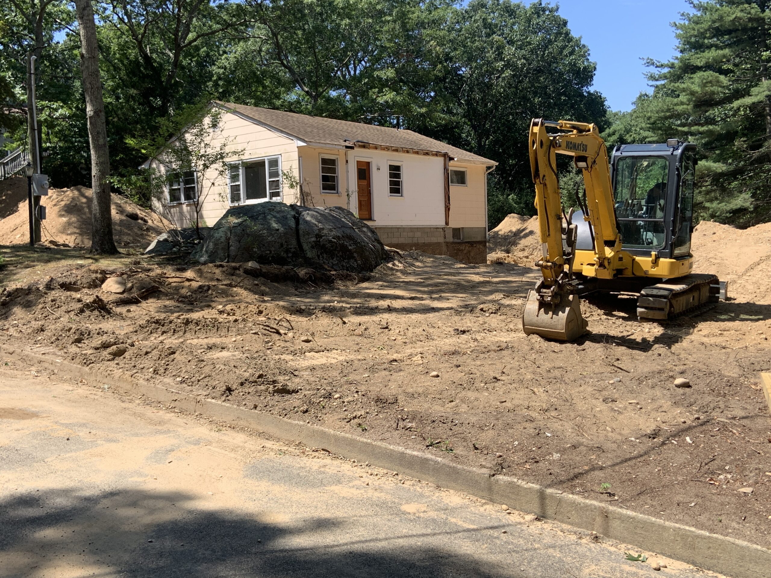 Although many modest houses remain in Azurest, many, like this one on Milton Avenue, are being renovated and expanded. STEPHEN J. KOTZ